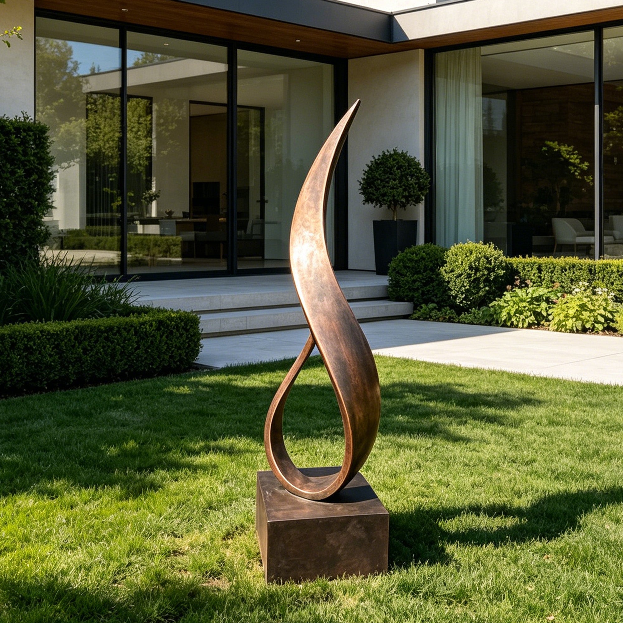 bronze sculpture in a garden