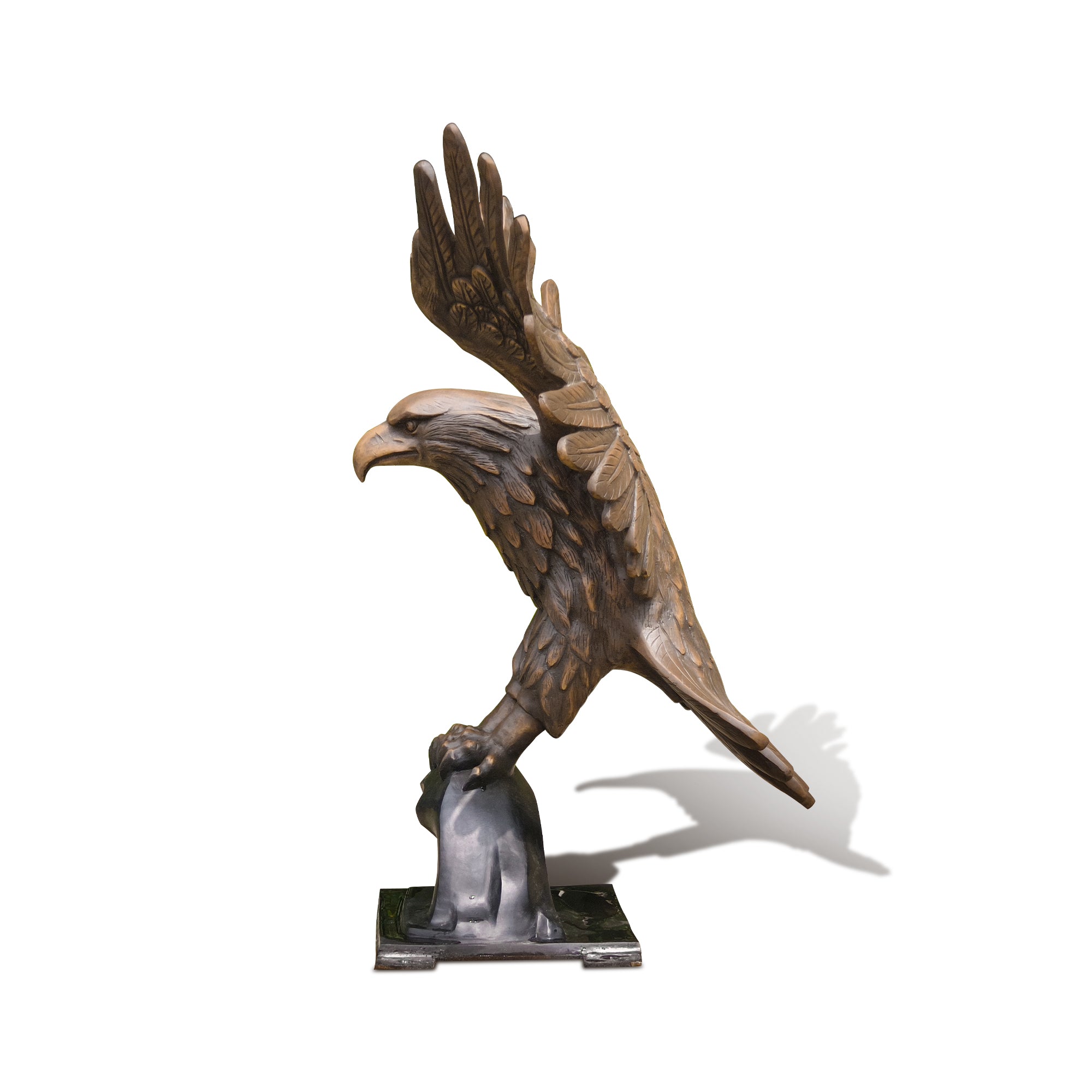 Bronze statue of an eagle on a white background