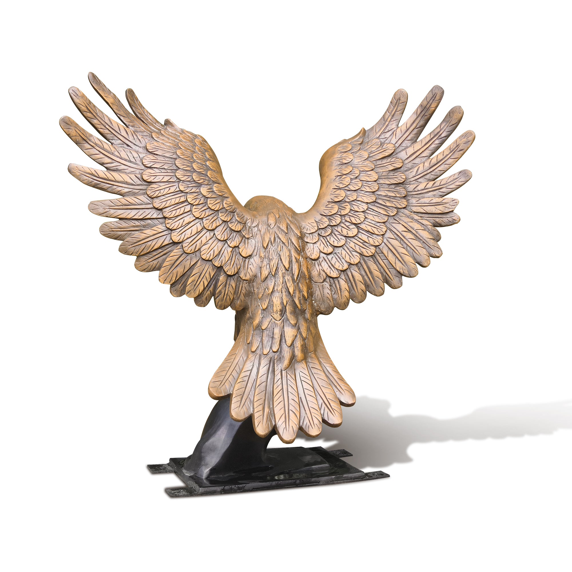 Bronze eagle sculpture with outstretched wings on a white background
