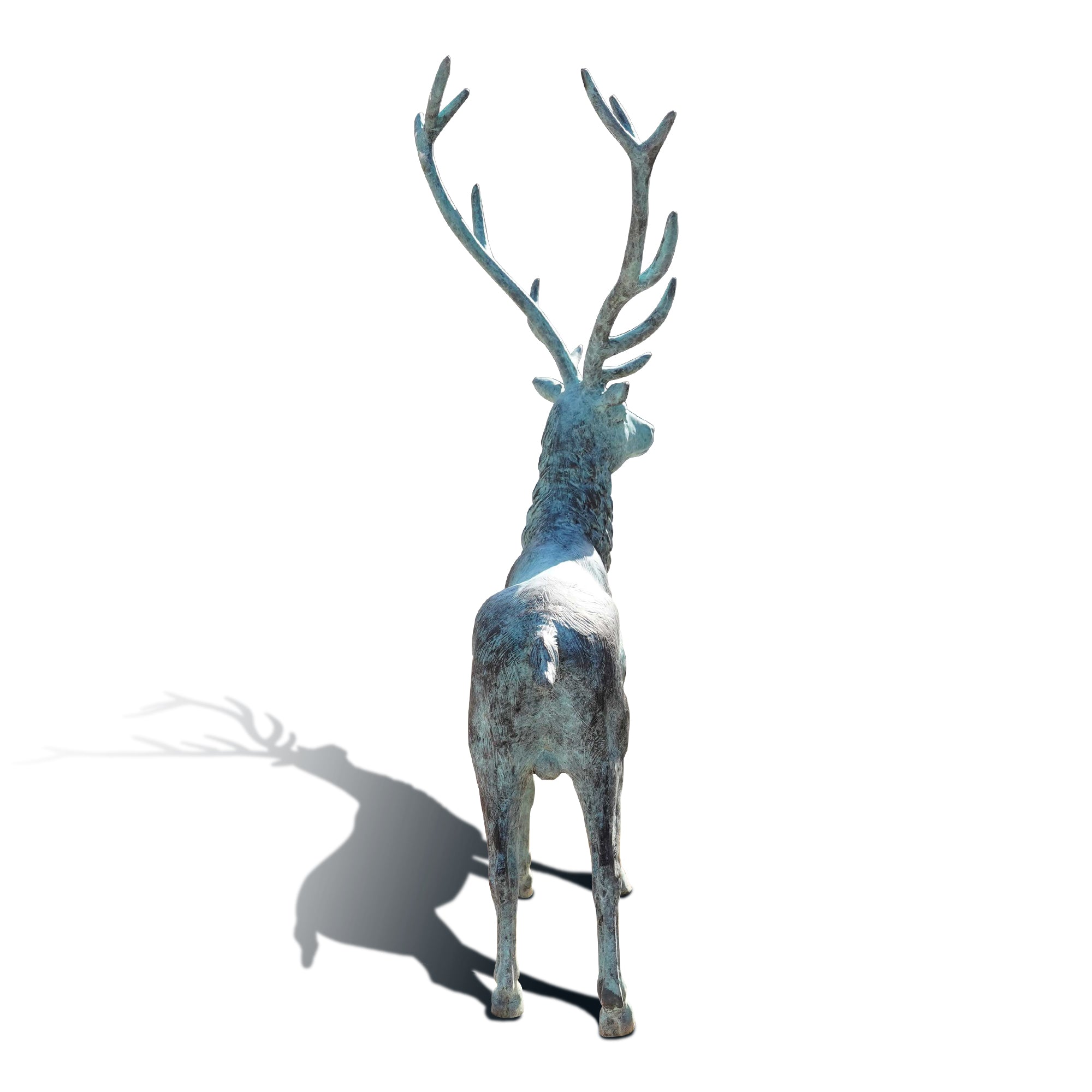 Decorative bronze deer sculpture with antlers on a white background