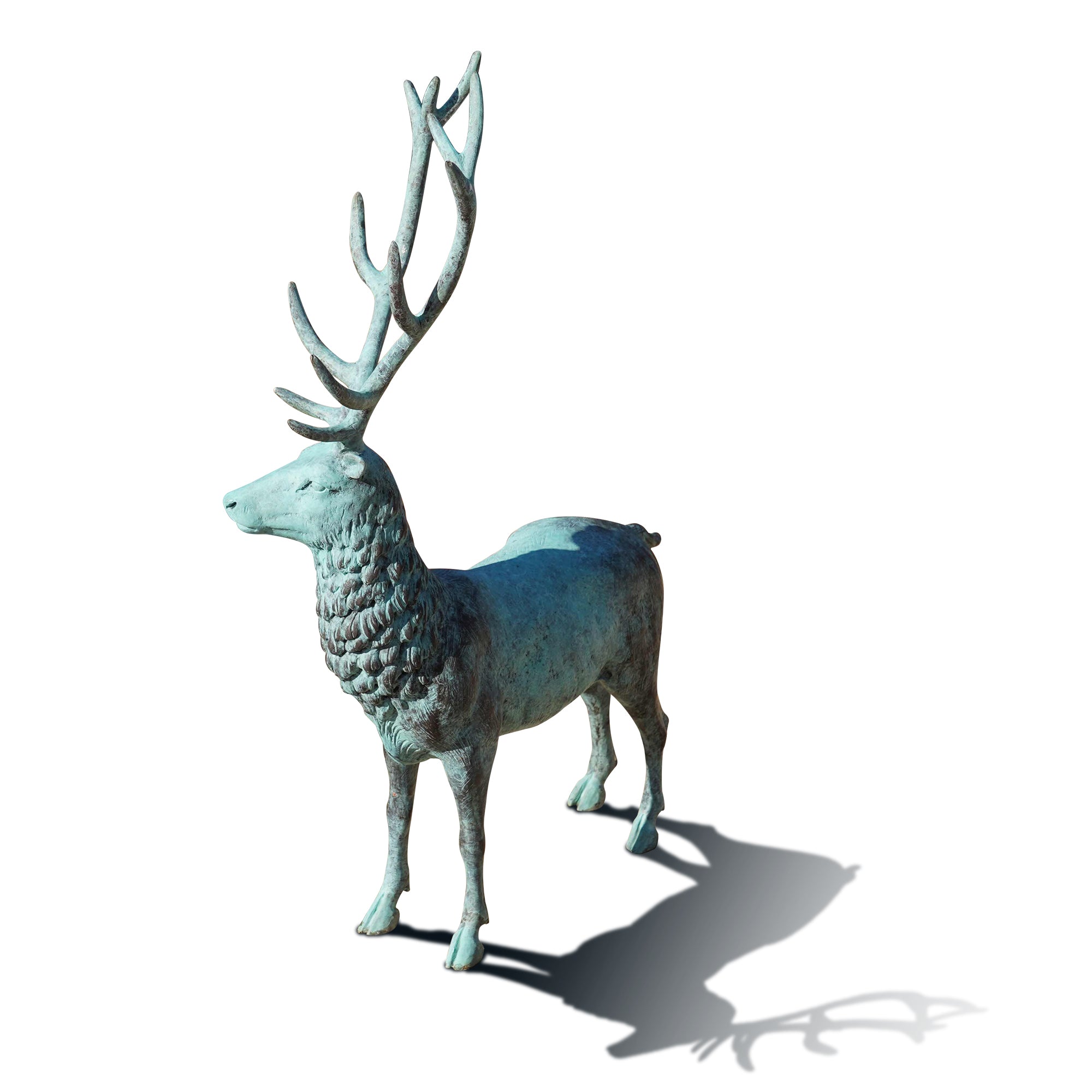 Bronze deer statue on a white background