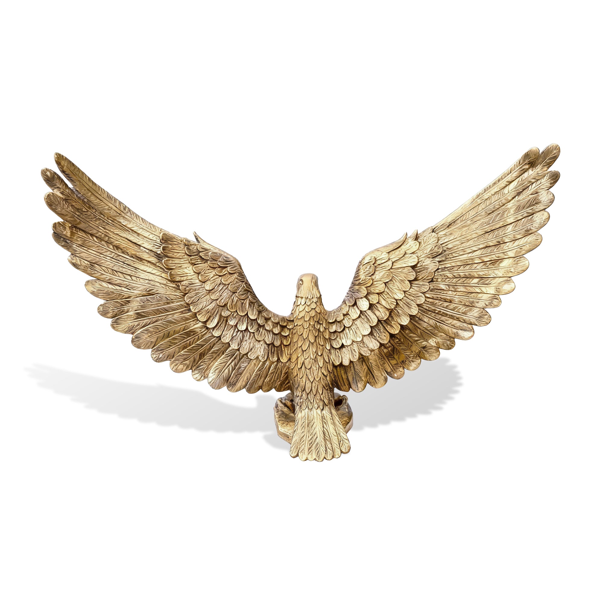 Gold eagle sculpture on a white background