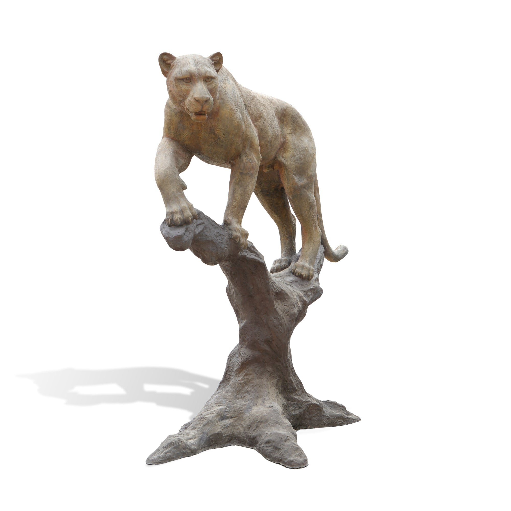 Statue of a lioness on a branch with a white background