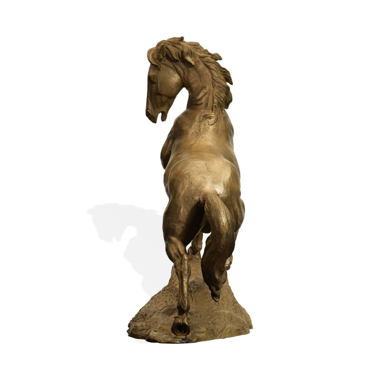 Bronze statue of a rearing horse on a white background