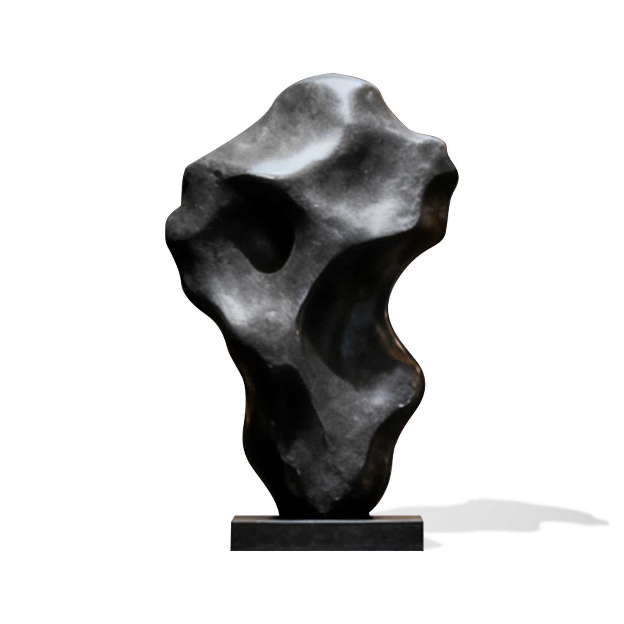 Abstract black sculpture on a white background