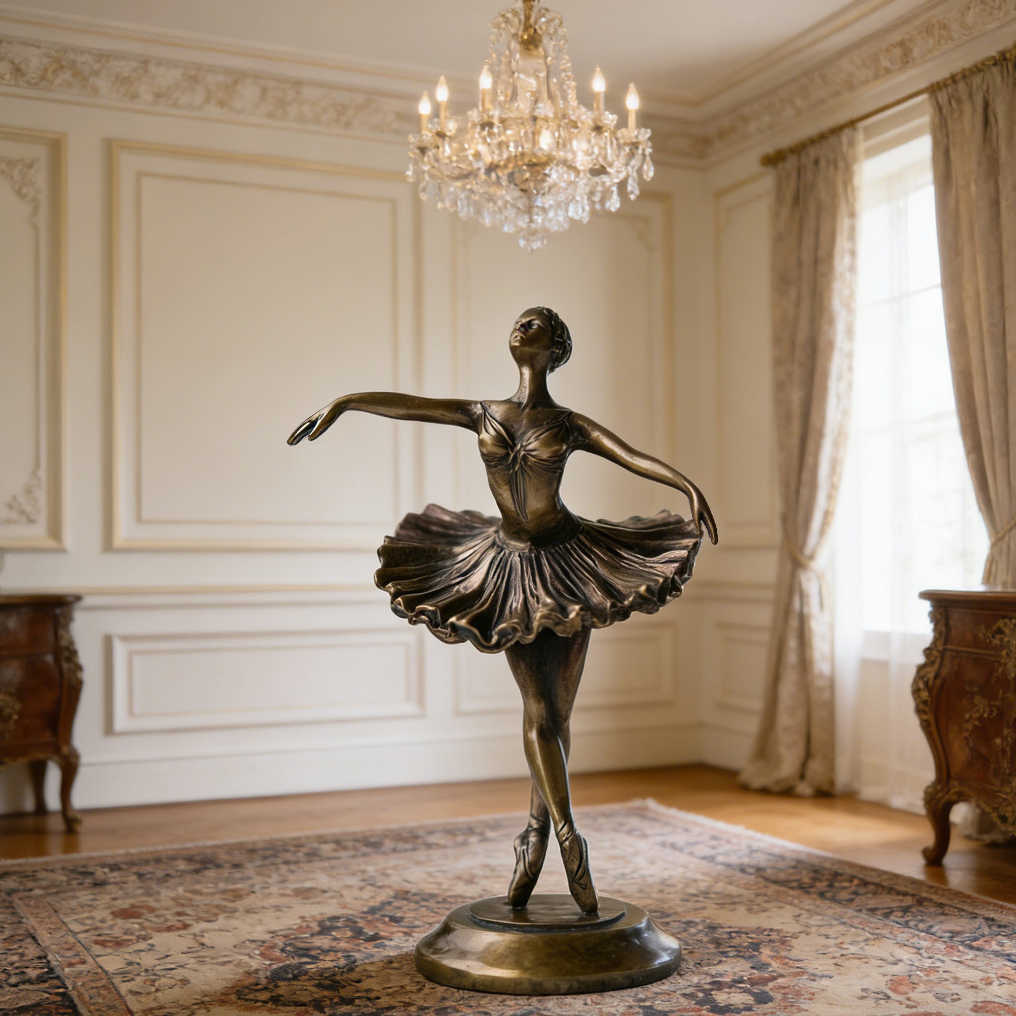 Bronze statue of a dancer in an elegant room with a chandelier