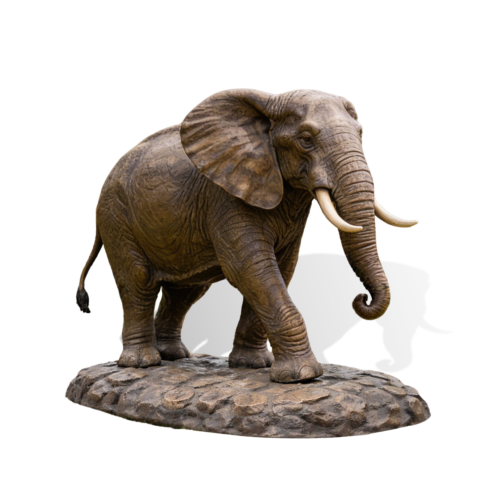 Bronze elephant statue on a white background