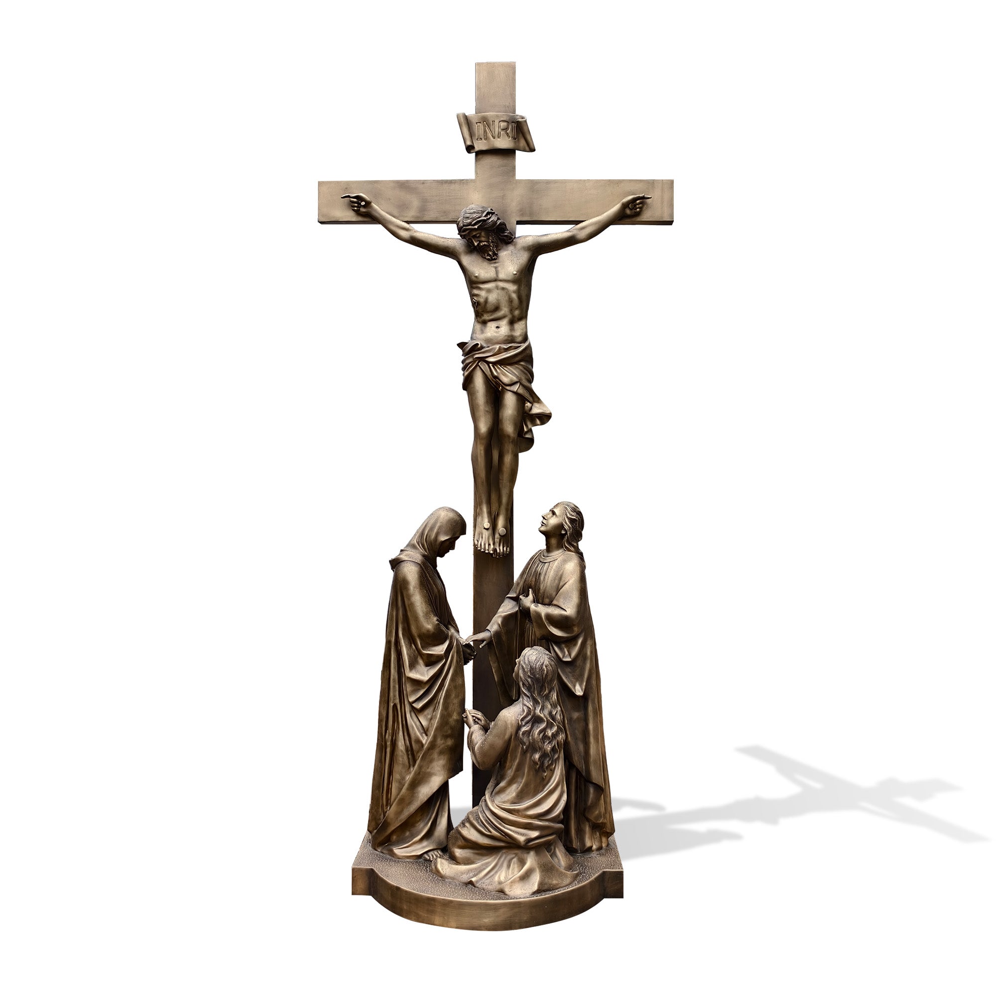 Bronze sculpture of a crucifixion scene with three figures on a white background