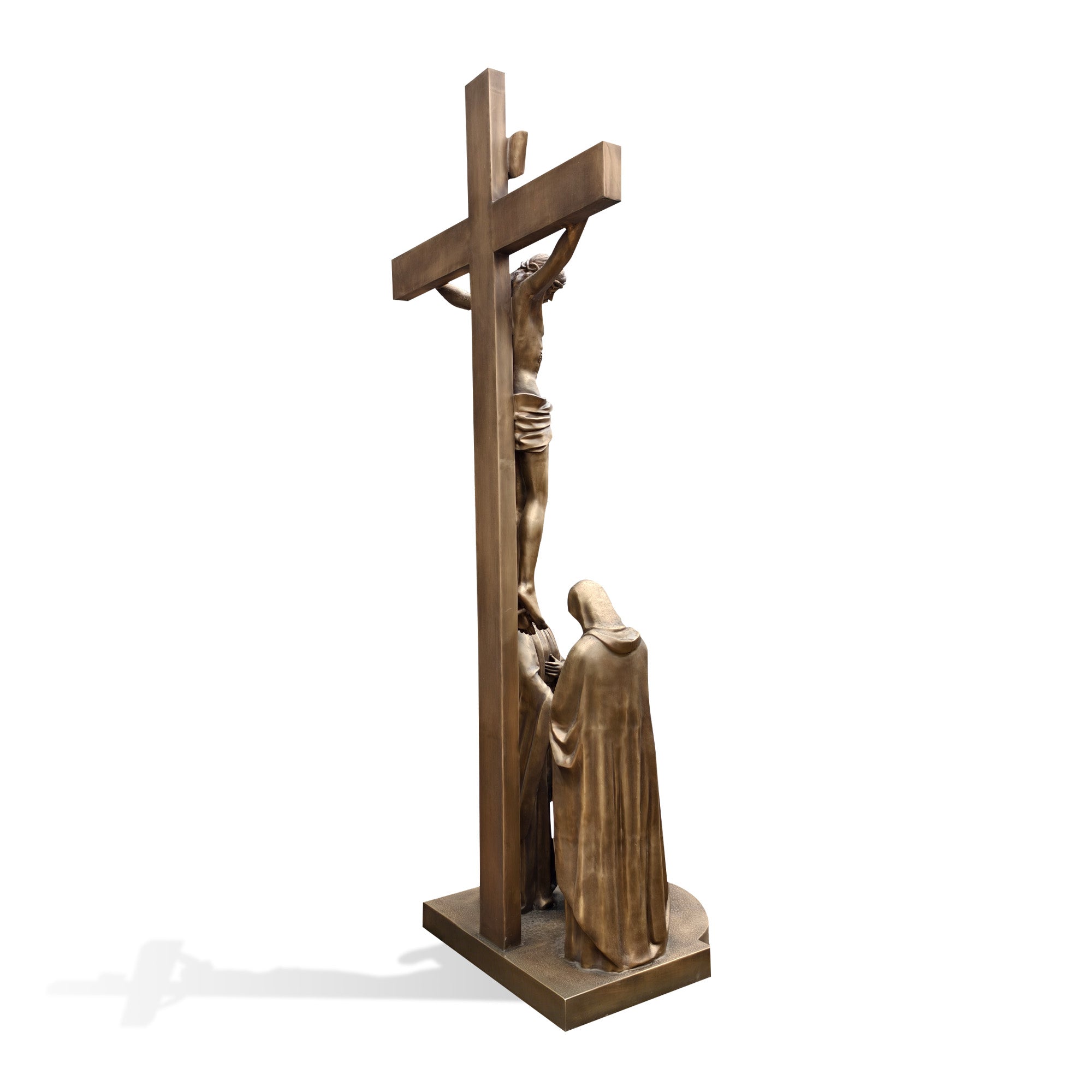 Bronze sculpture of a person at the foot of a cross on a white background