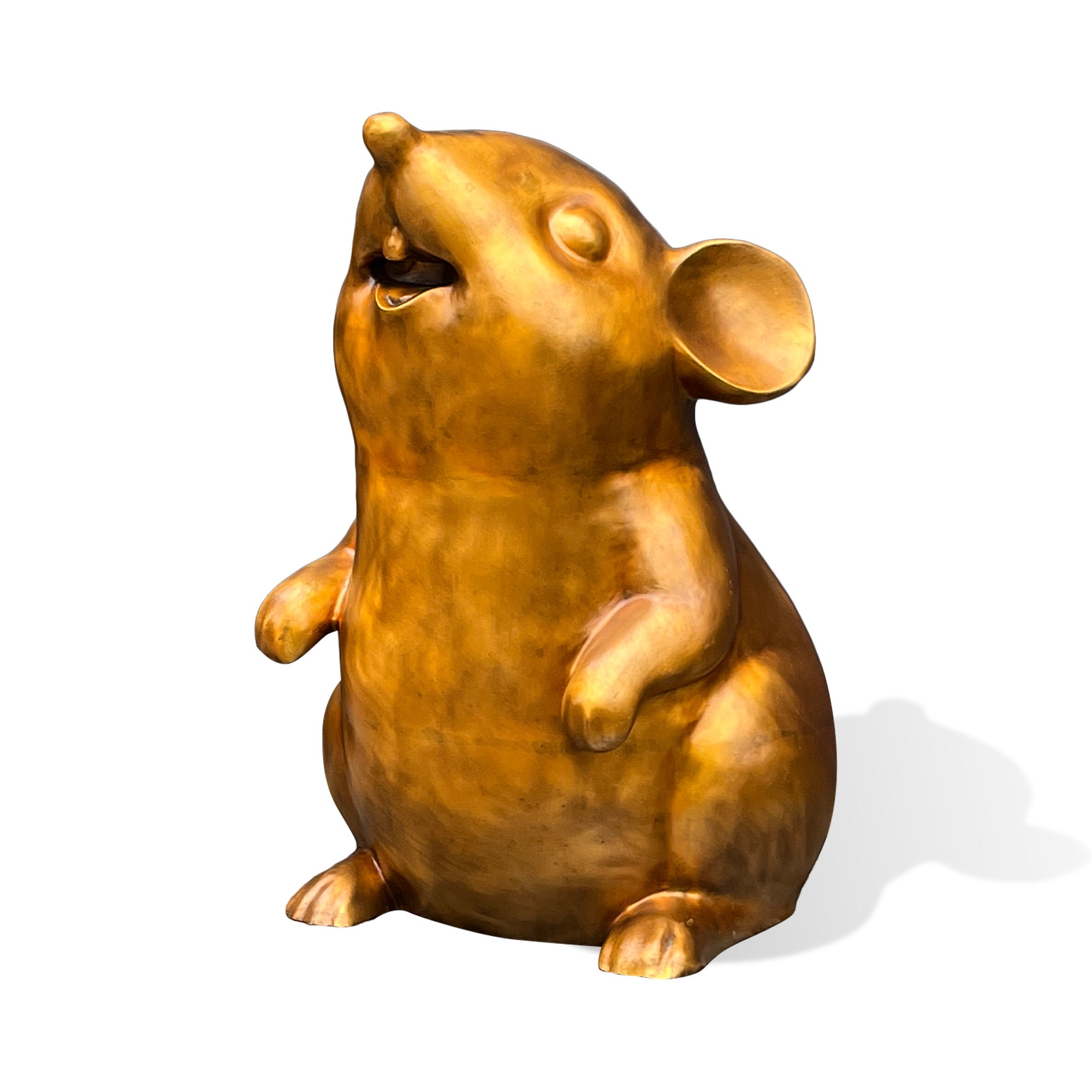 Front three-quarter view of a golden bronze mouse sculpture with a rounded belly, raised front paws, large circular ears, and an upward-facing expression.