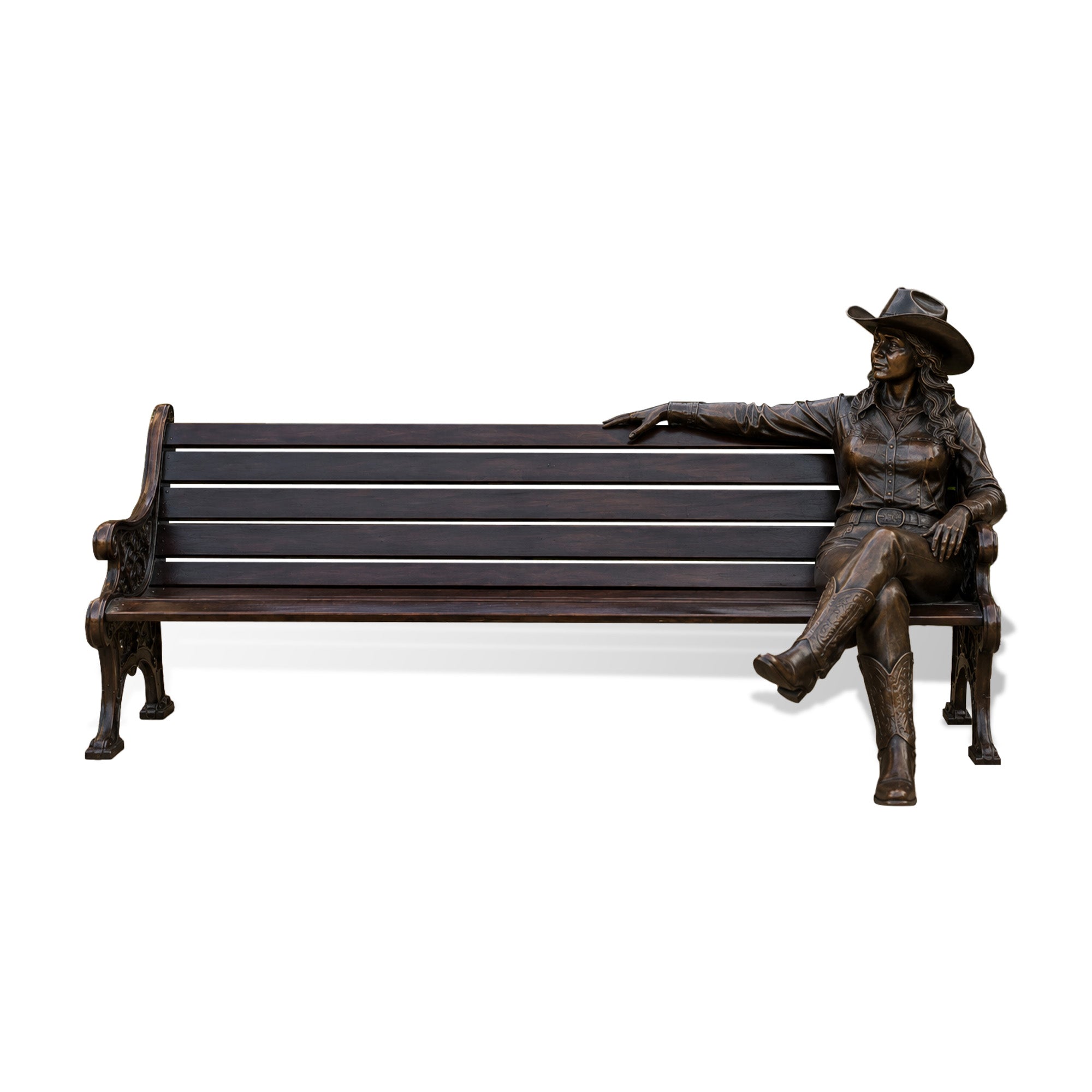 Bronze cowgirl bench sculpture with seated western woman wearing cowboy hat, boots, shirt, belt, crossed legs, and functional outdoor park bench on white background