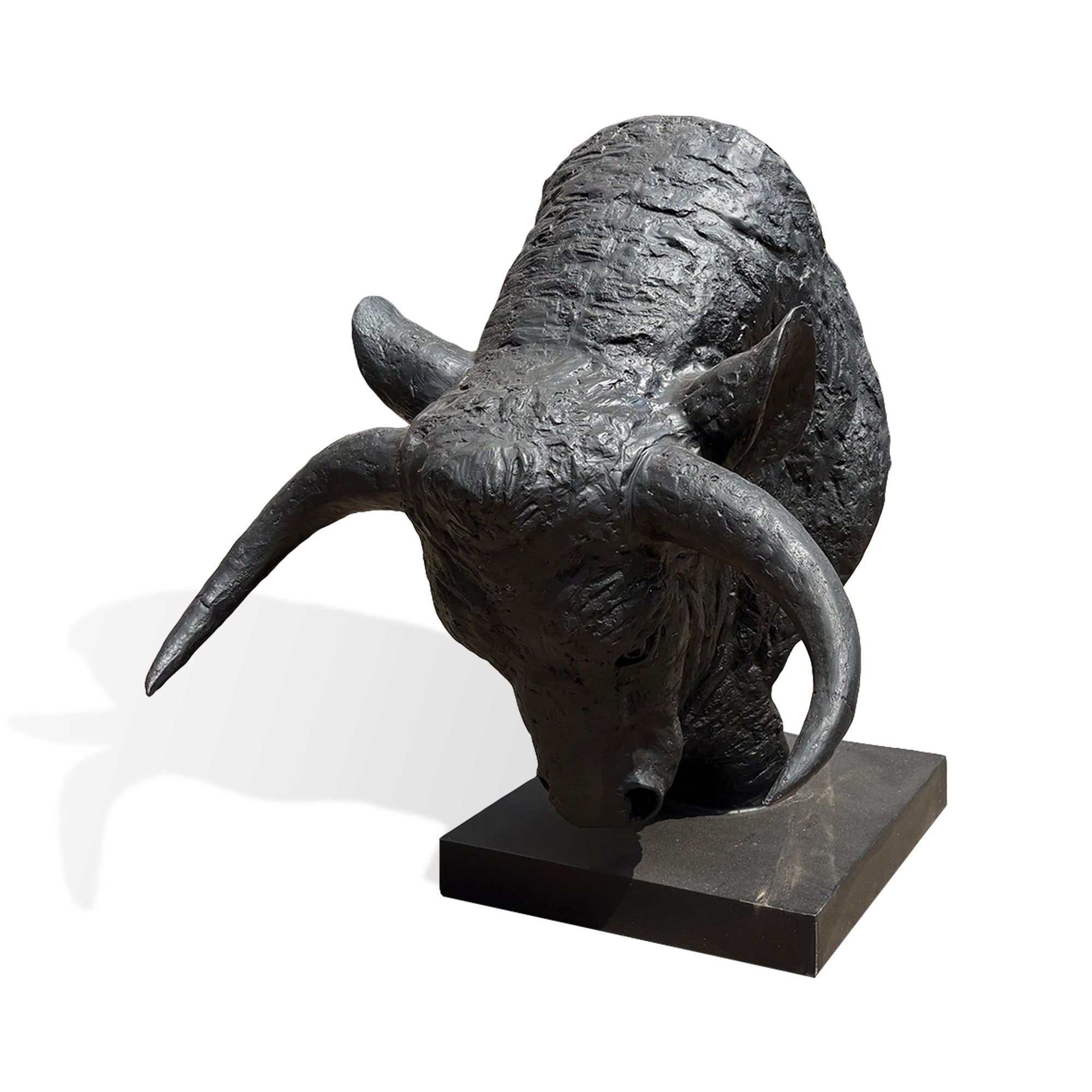 Front view of black bronze bull head statue featuring symmetrical horns, rugged texture, strong facial expression and artistic metal casting finish.