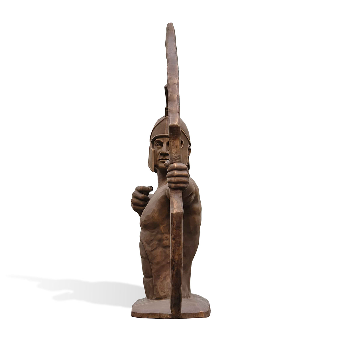 Front view of an ancient warrior bronze statue aiming a large curved bow, with a crested Greek-style helmet and detailed upper body