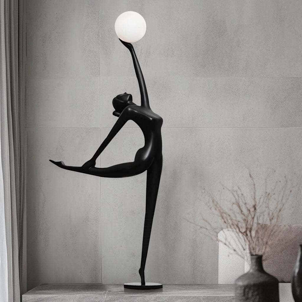 Custom Black Abstract Human Light Sculpture, matte black indoor floor sculpture featuring a glowing sphere.