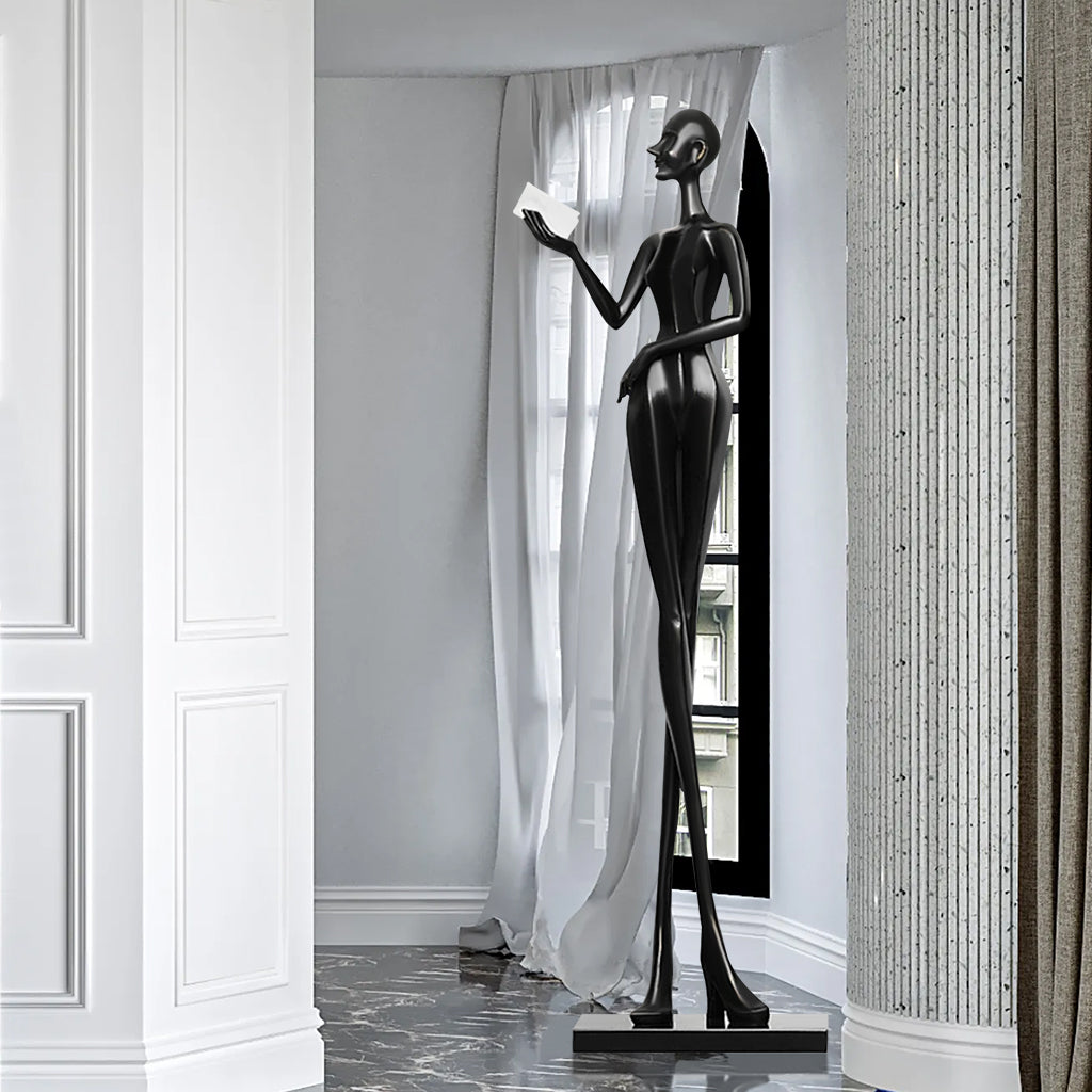 Custom human abstract black indoor floor sculpture with glossy black finish, display indoor living room