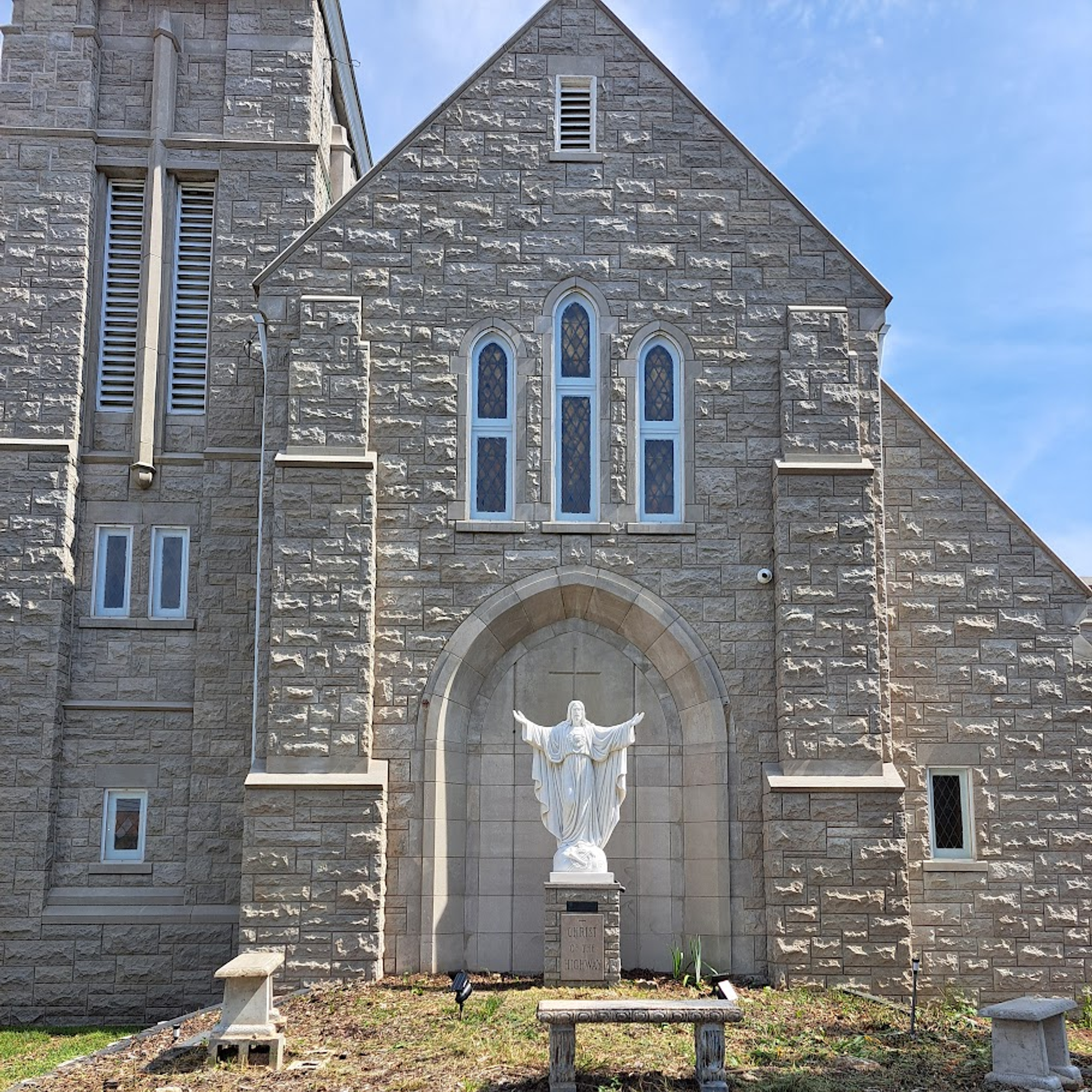 white marble jesus christ statue at outside St.patrick catholic church in rolla missouri