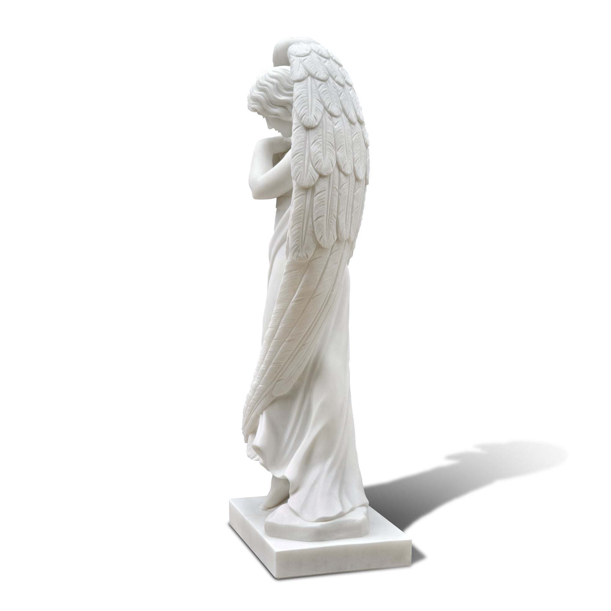 Side profile of classic marble angel statue – perfect for garden or patio decor