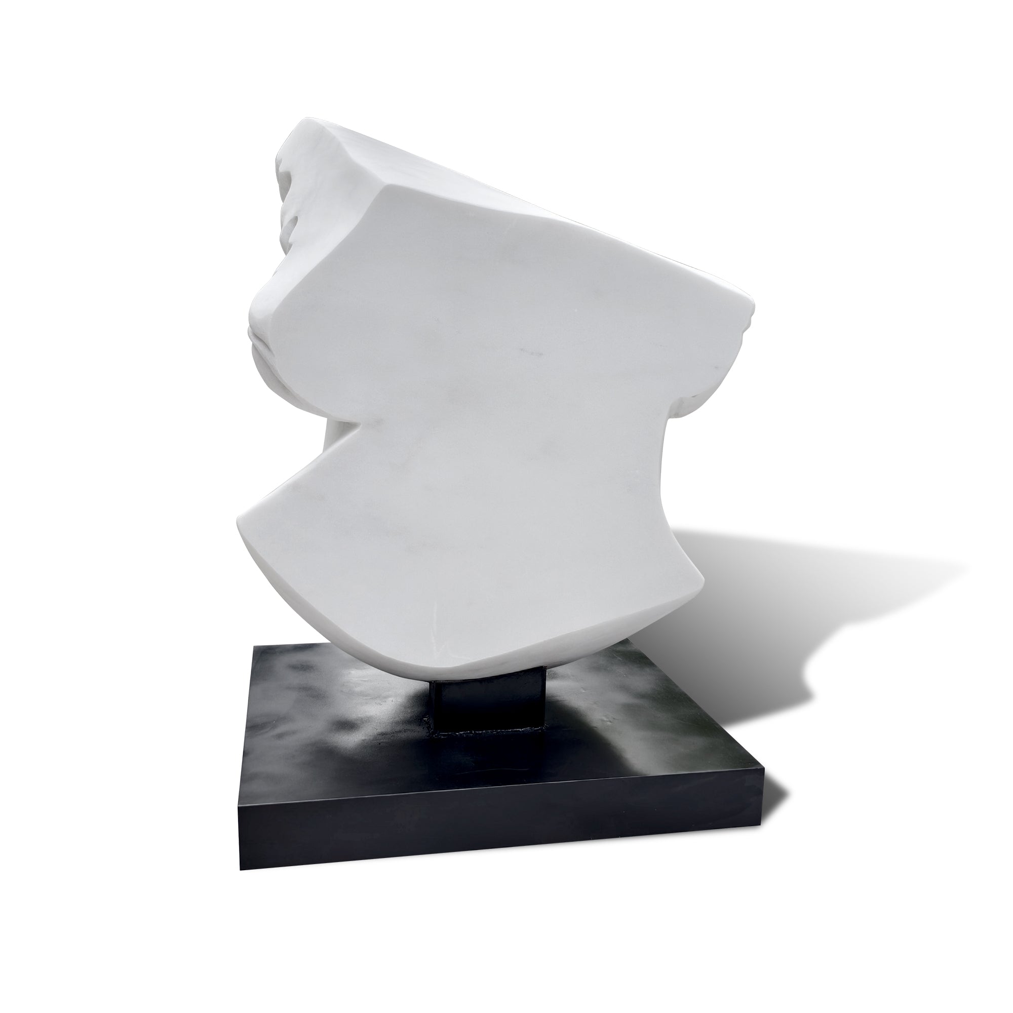 White abstract sculpture on a black base against a white background