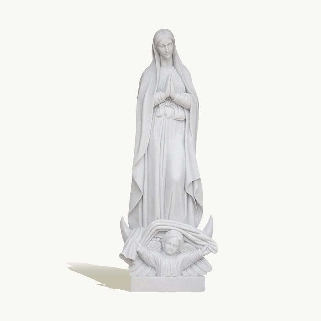 Marble statue of Our Lady of Grace standing in prayer over an angel, symbolizing faith and devotion.