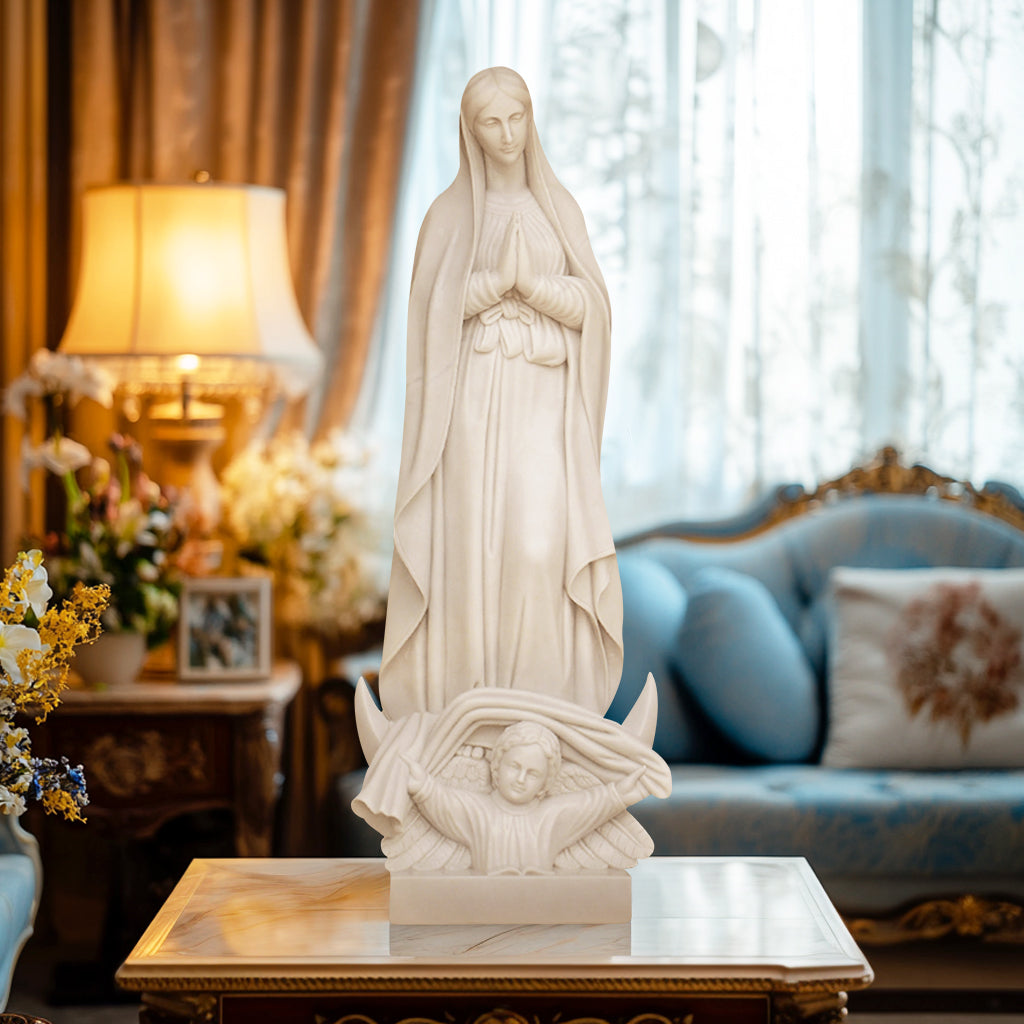 Marble statue of Our Lady of Grace standing in prayer over an angel, display indoor