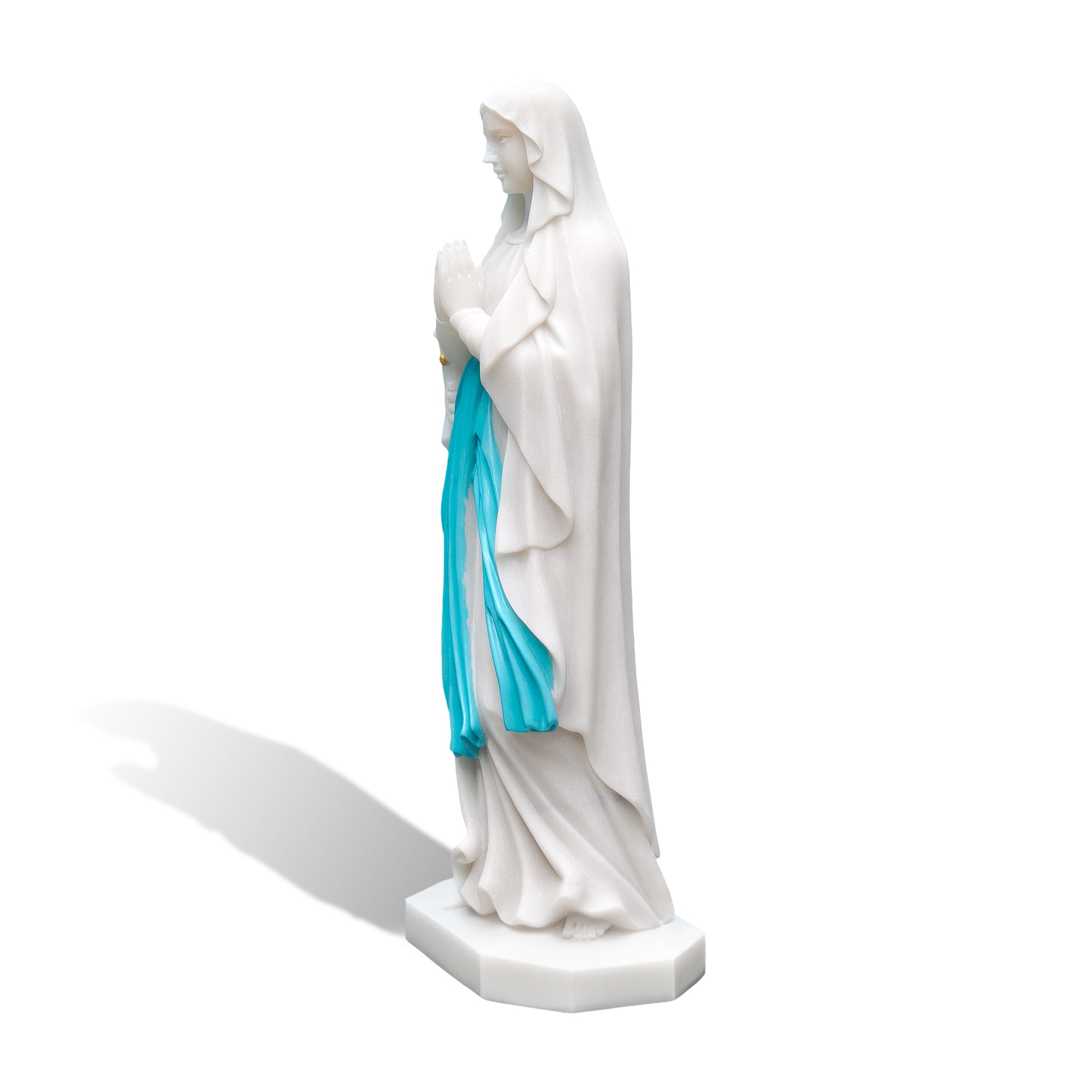 Side view of Our Lady of Lourdes marble statue showing carved drapery, white background-1