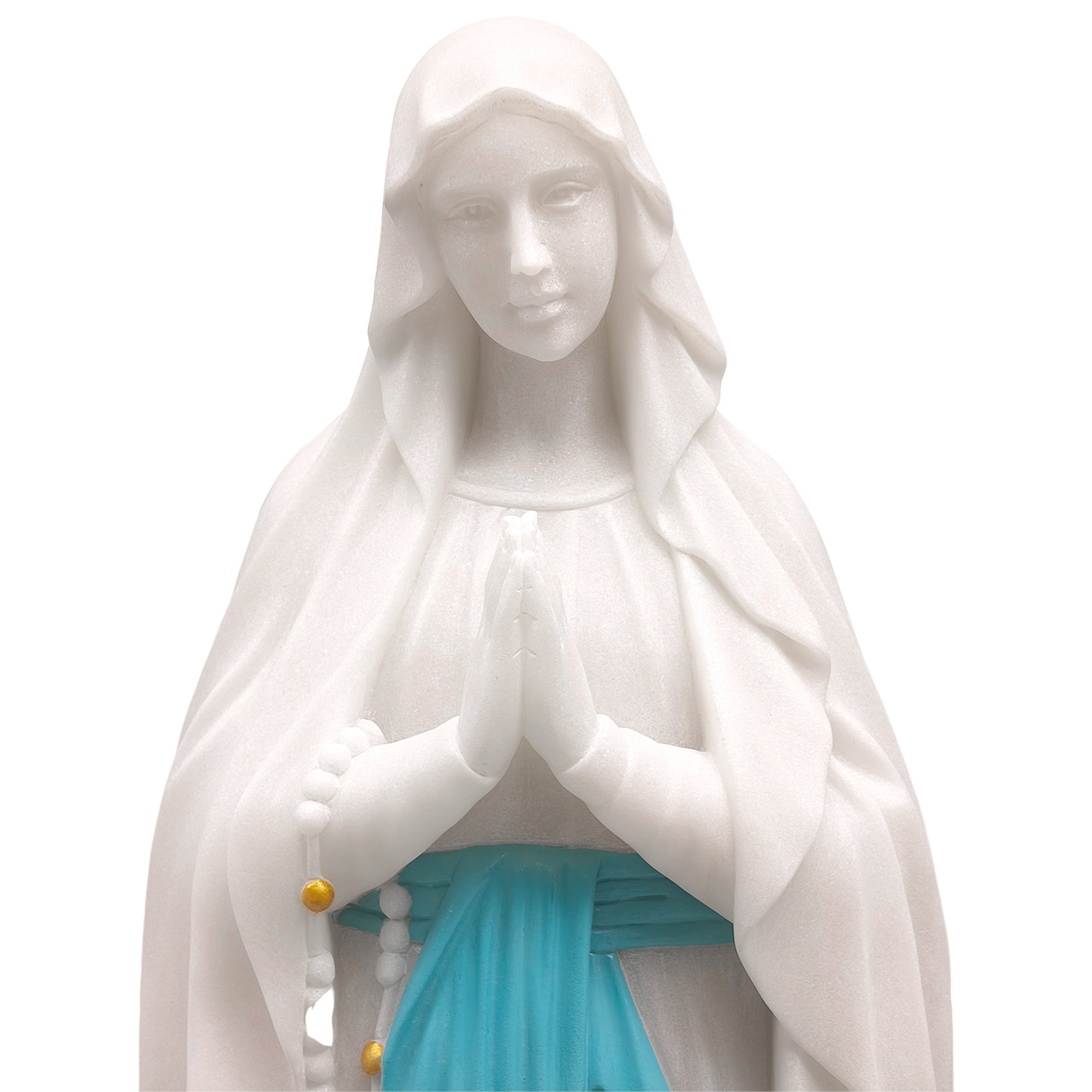 Close-up of Our Lady of Lourdes marble statue face, delicate hand-carved details, white background