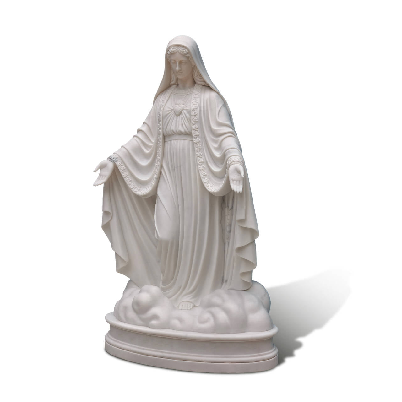 marble Virgin Mary statue highlighting the flowing drapery and posture