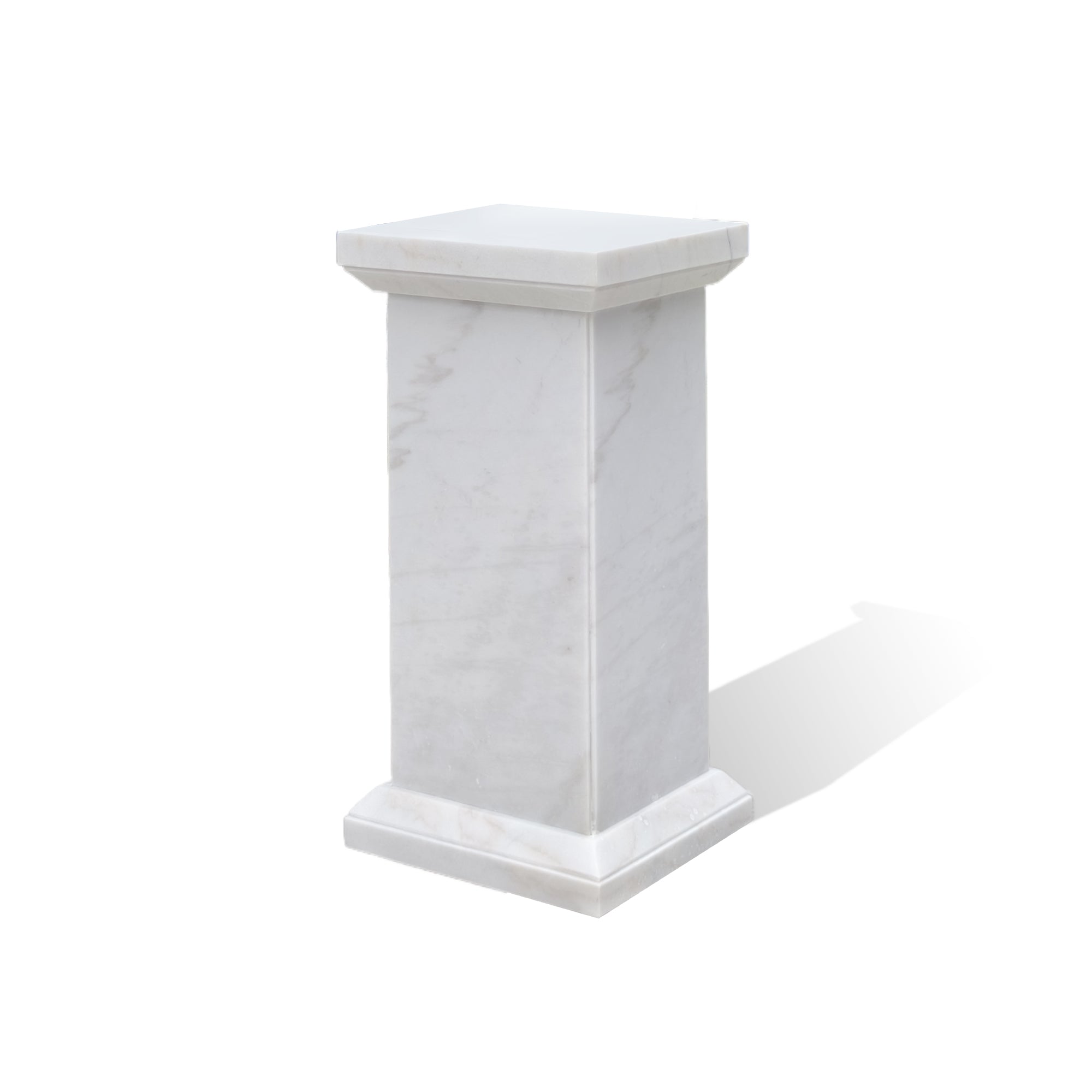 Square marble base crafted to support garden sculptures securely