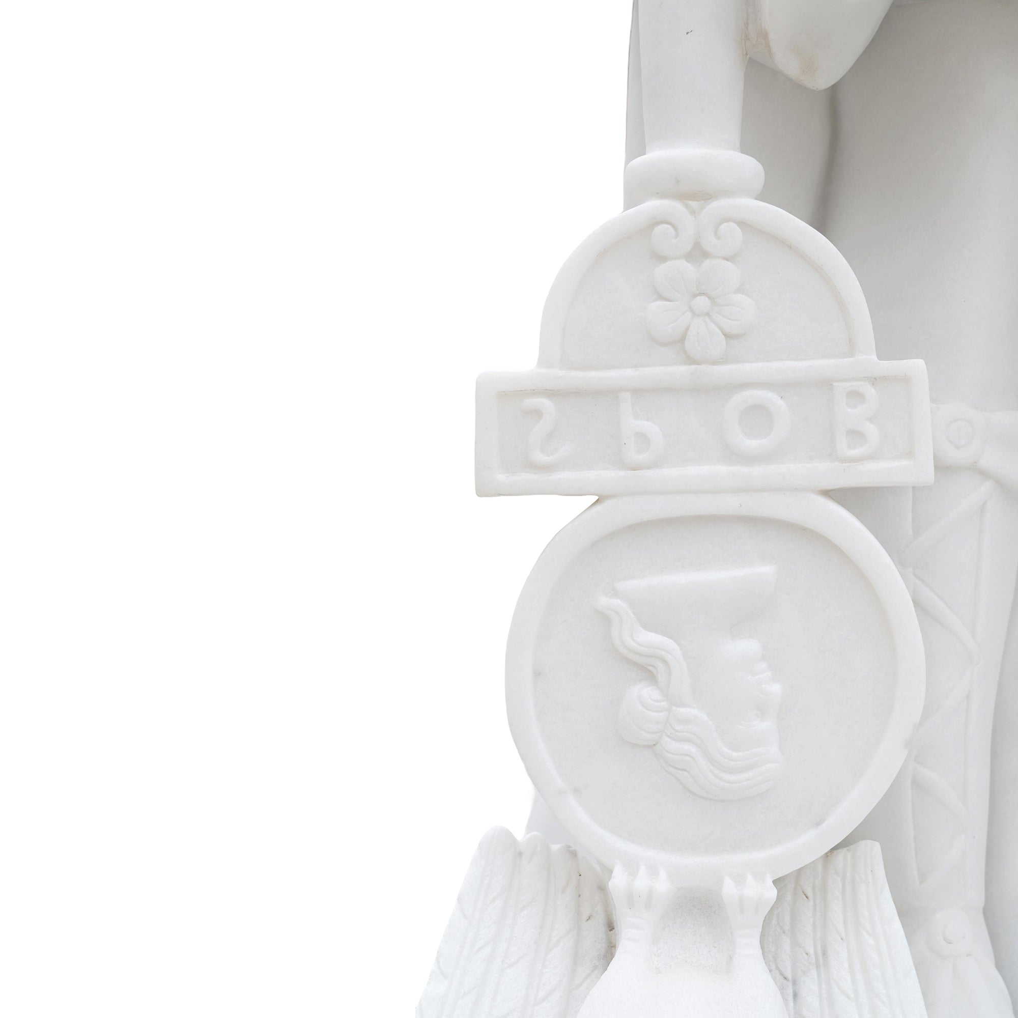 minerva shield and victory medallion relief detail on white marble statue