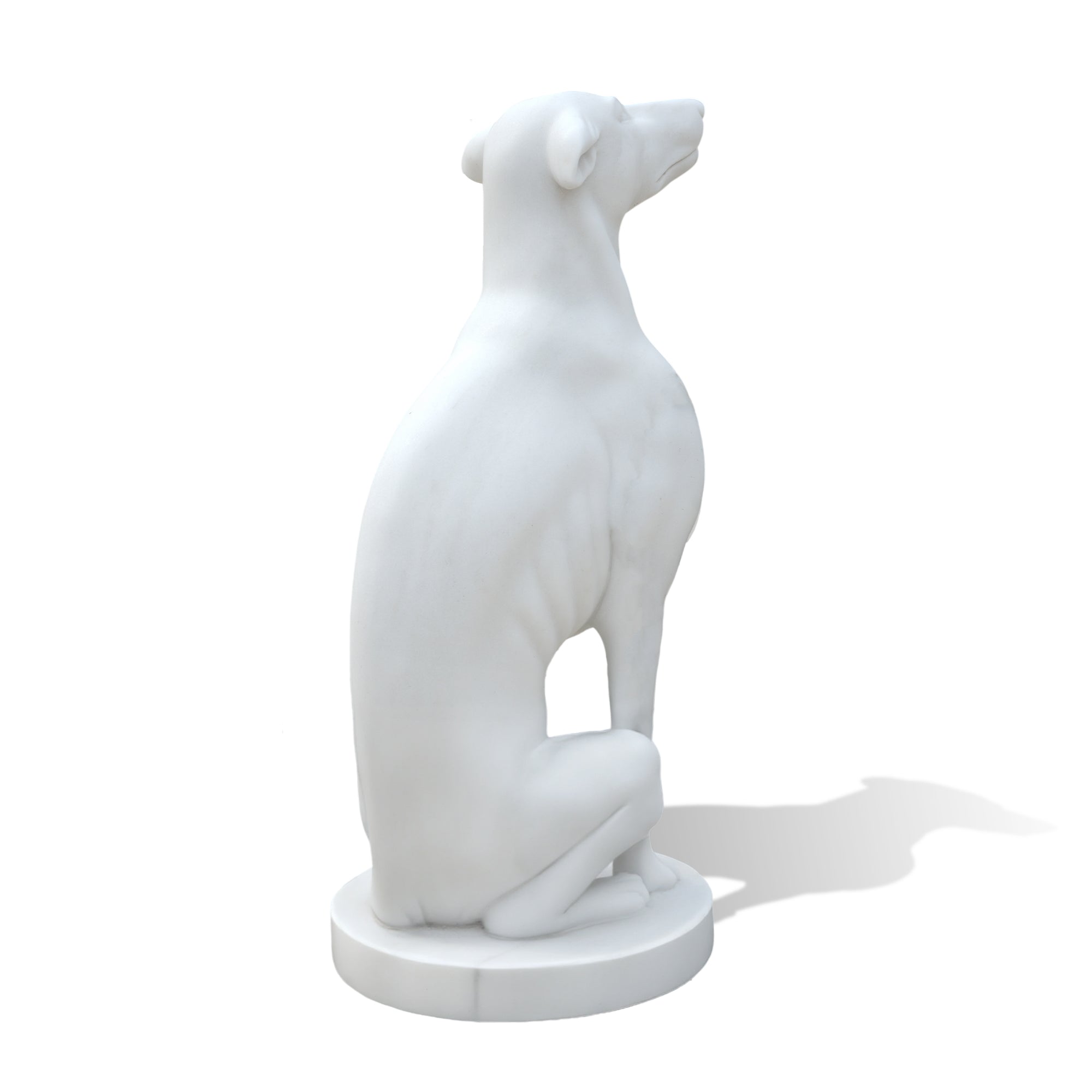 back view of sitting marble greyhound dog sculpture with smooth natural white finish