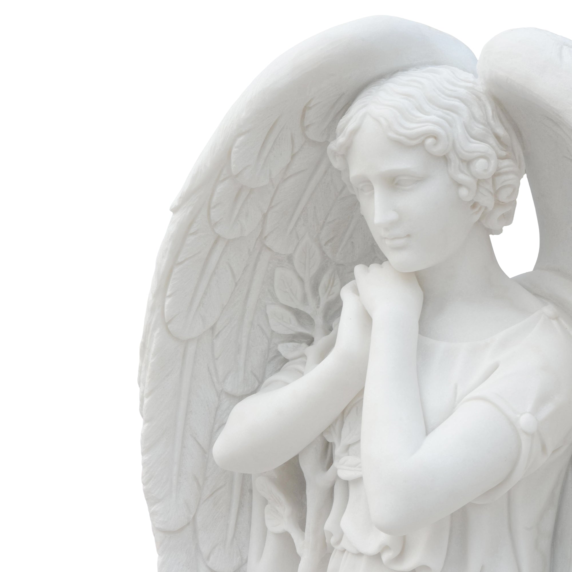 marble angel sculpture head closeup with carved wings spiritual memorial art
