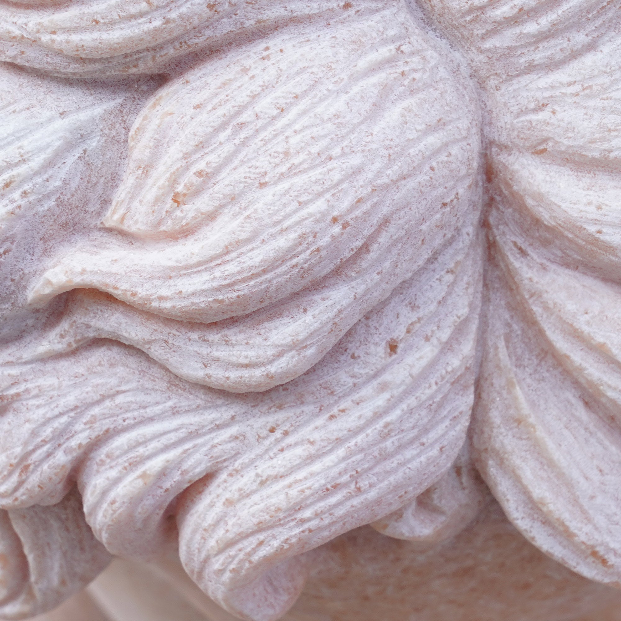 Close-up of the finely sculpted hair of the two children in the marble sculpture, highlighting the textural detail and fine craftsmanship. A timeless addition to luxury spaces and garden art collections.