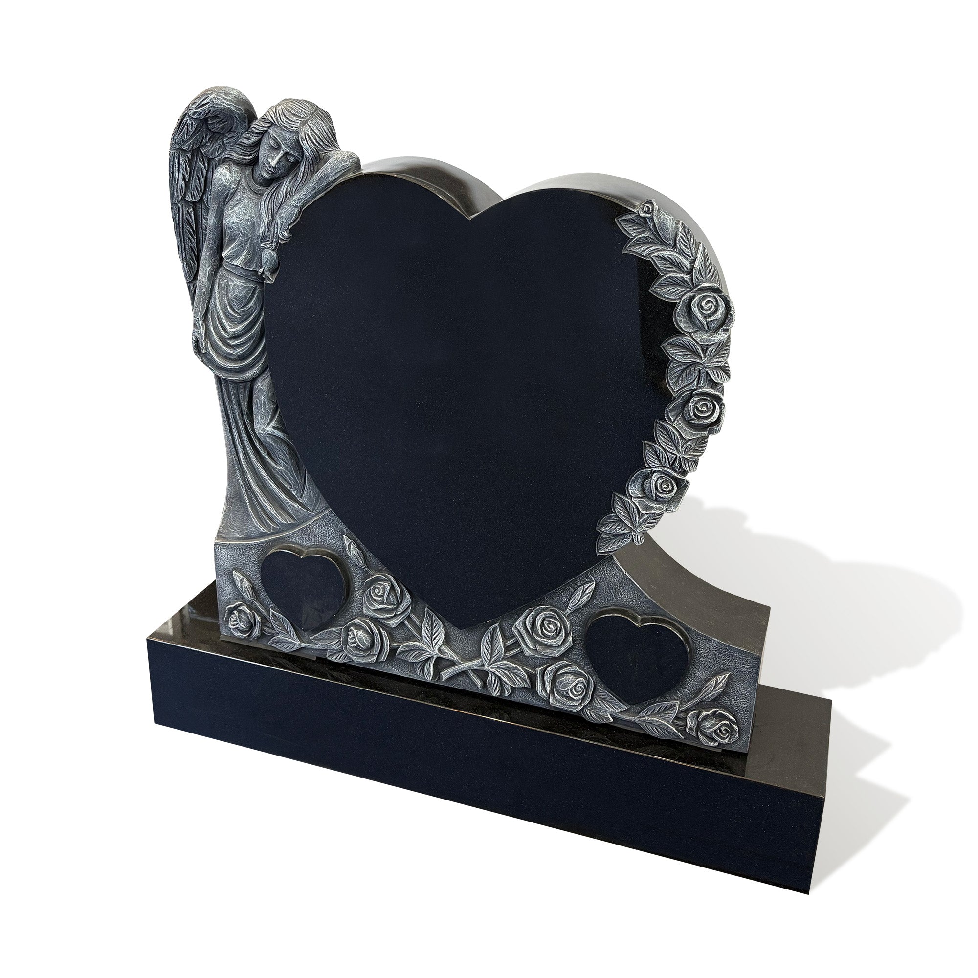 Side view of a custom black granite angel and rose headstone showing the layered relief carving, polished heart center, and personalized memorial design