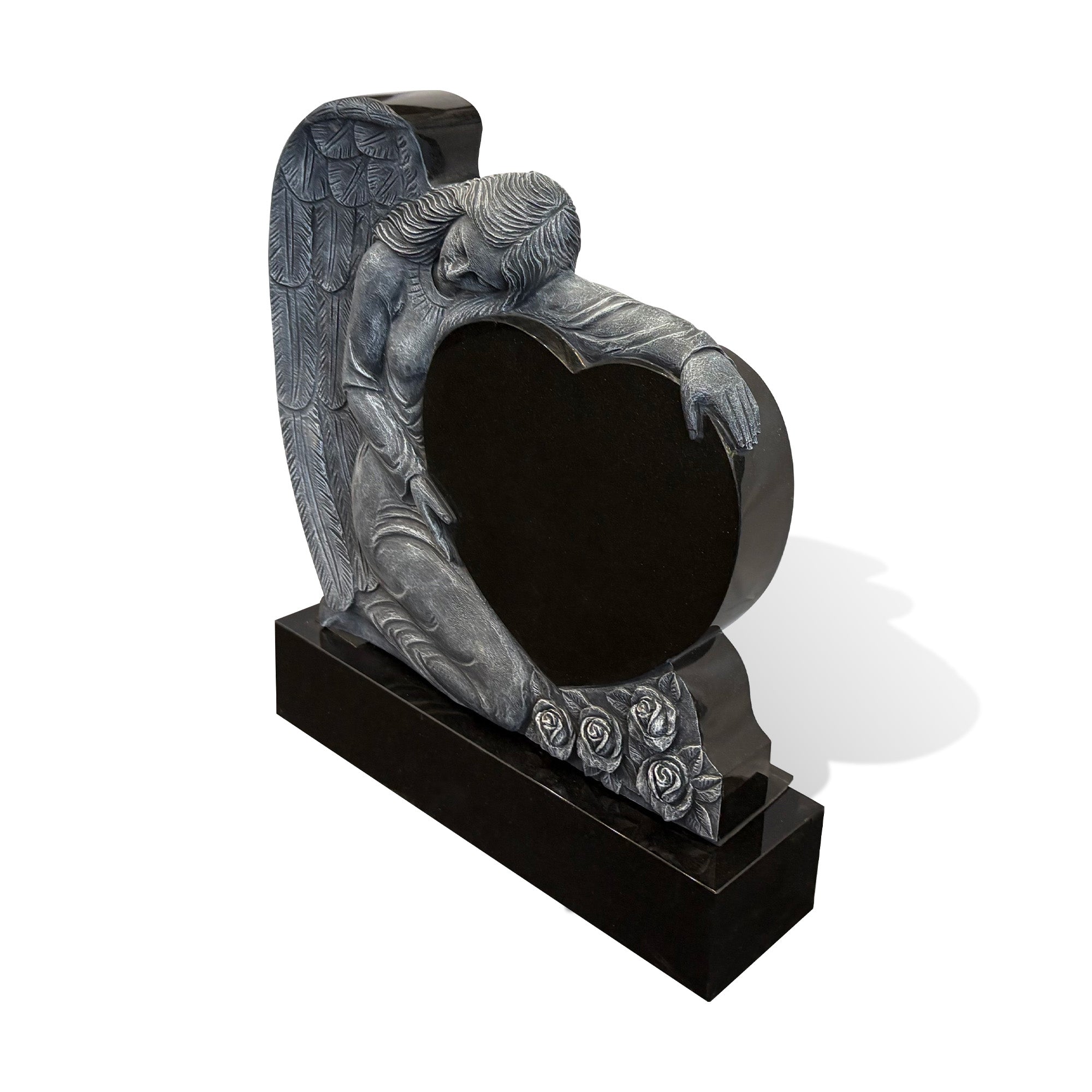 black granite heart memorial headstone with a smooth polished surface and sculpted angel silhouette for a personalized cemetery monument