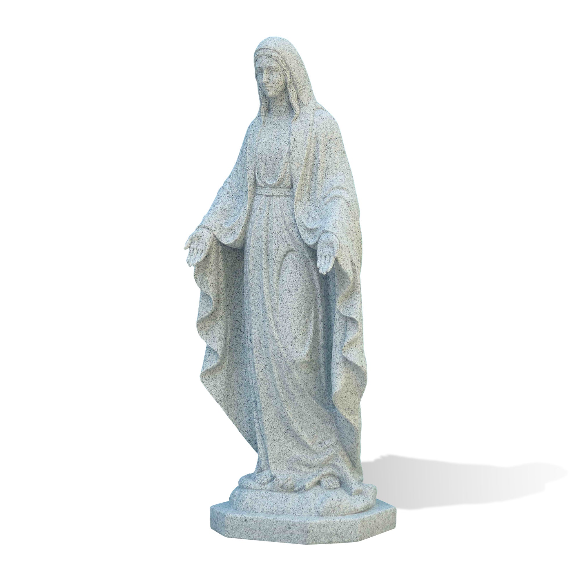 Three-quarter view of a natural grey granite Virgin Mary sculpture with open palms, draped cloak, and detailed robe carving