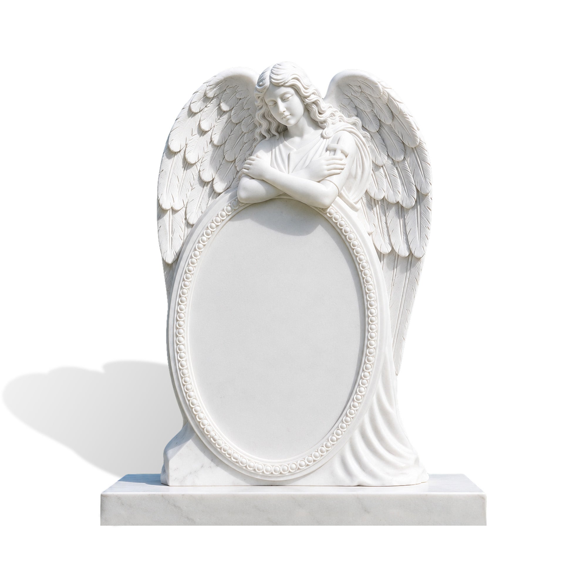 Front view of a hand-carved white marble angel headstone with feathered wings, crossed arms, flowing robe, and oval memorial engraving area