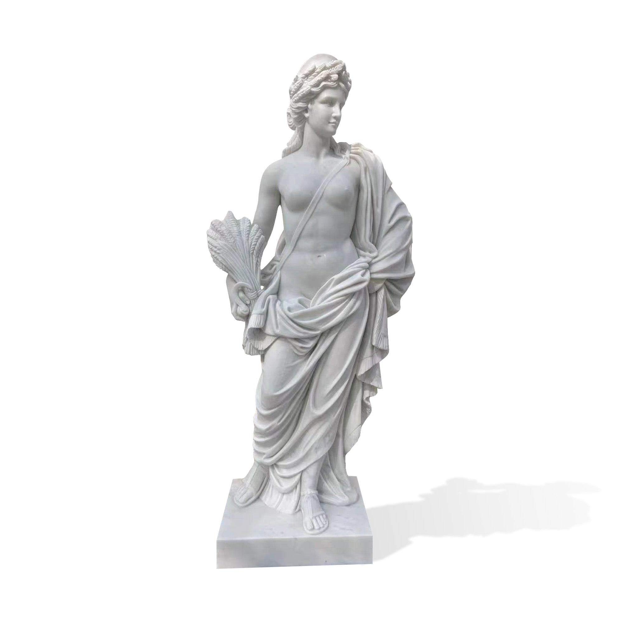 Classical marble harvest goddess statue with wheat in hand, flowing robe, elegant female figure, and square base on white background