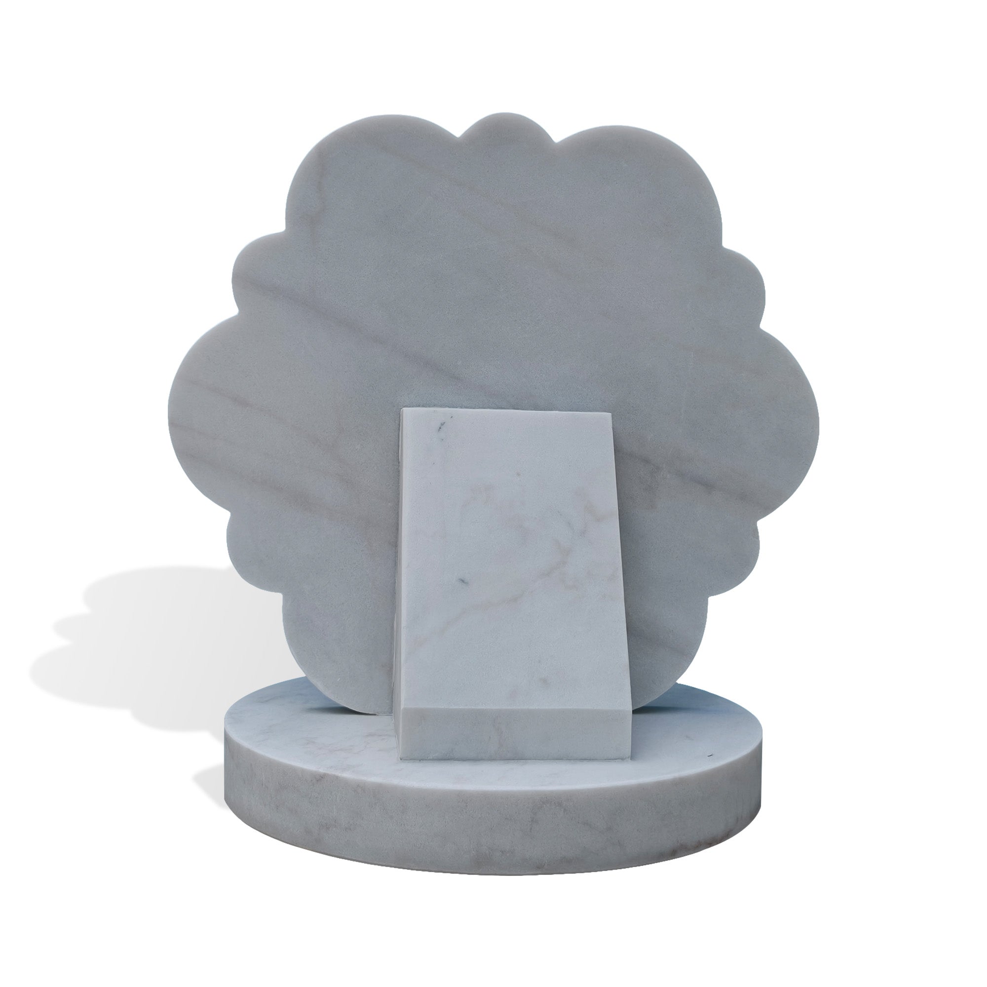 Back view of white marble interfaith unity sculpture with smooth flower-shaped rear panel, rectangular support block, round marble base, and white background