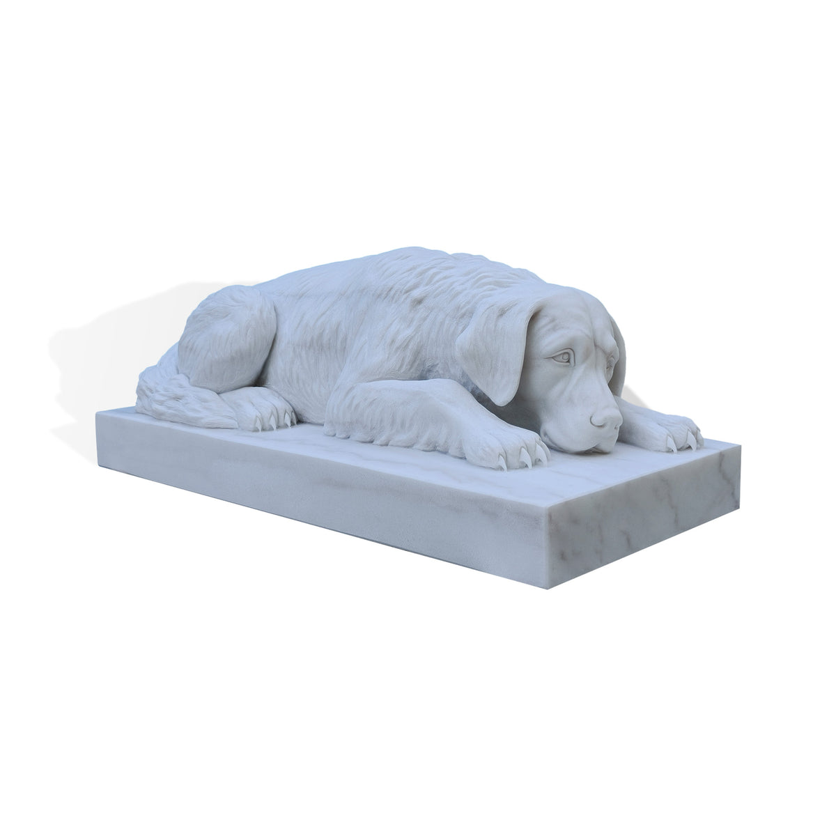 Three-quarter view of a white marble dog statue lying with its head resting between extended front paws, showing floppy ears, carved eyes, textured fur and a curled tail on a rectangular marble base against a white background.