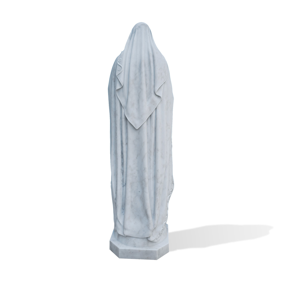 Rear view of a white marble Virgin Mary statue showing a pointed veil falling over the shoulders, long vertical mantle folds and subtle gray stone veining. Sections of the floral border remain visible along the sides above a faceted marble base.