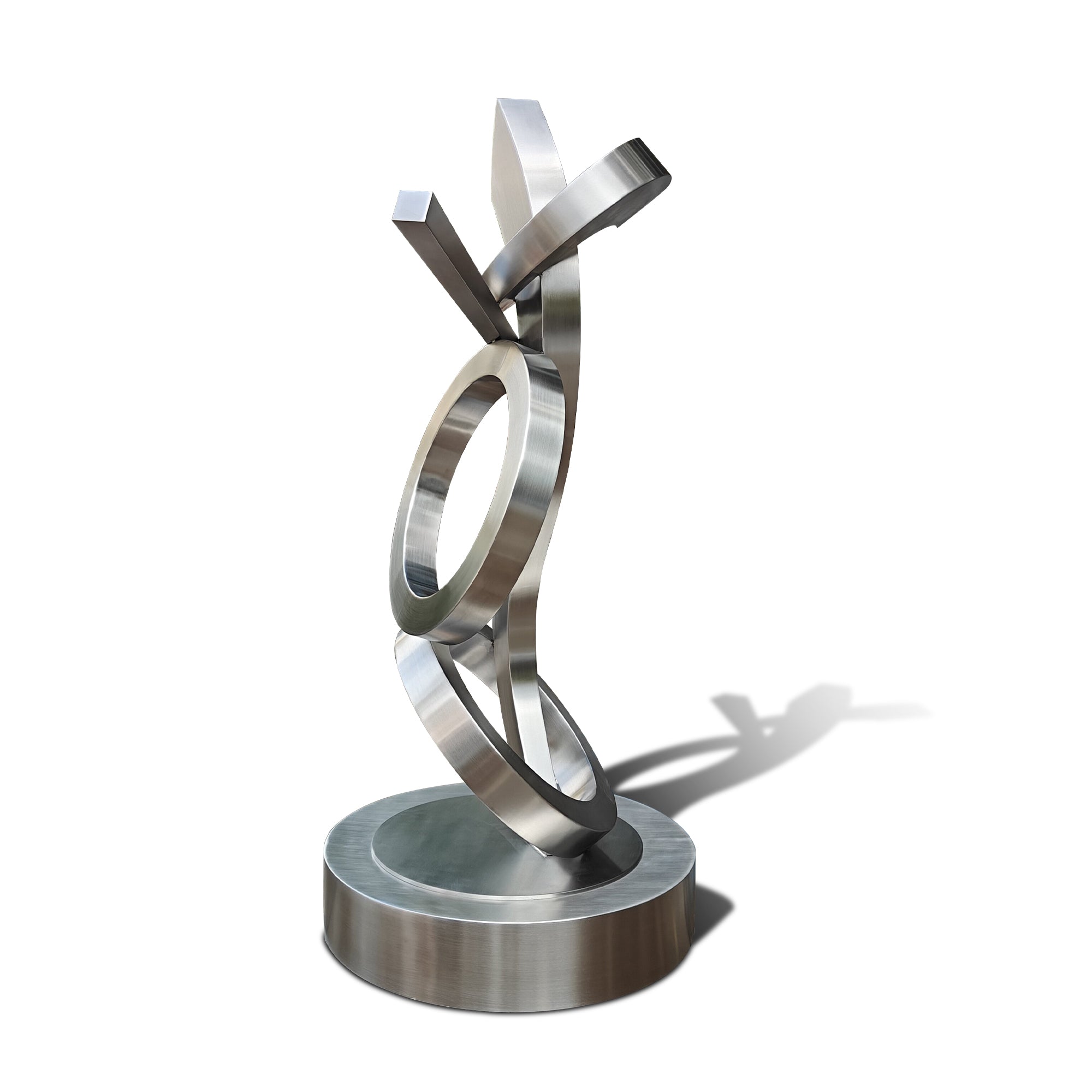 stainless steel sculpture with interlocking rings on a white