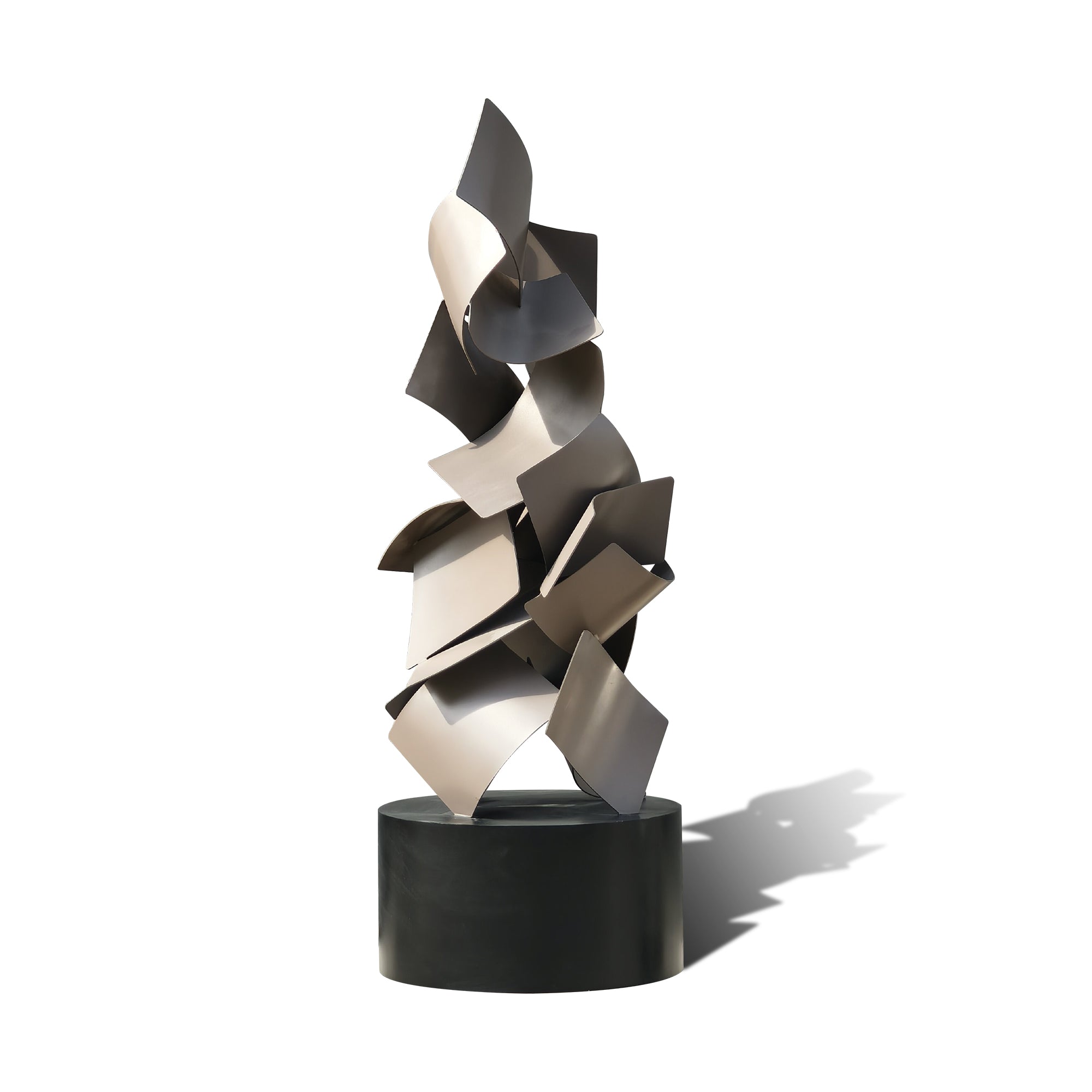 Abstract sculpture with geometric shapes on a white background