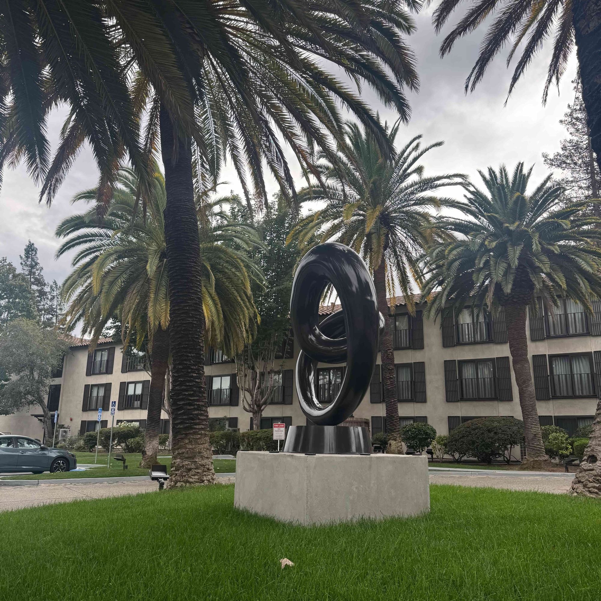 contemporary stainless steel heart sculpture displayed outside hilton hotel napa valley california