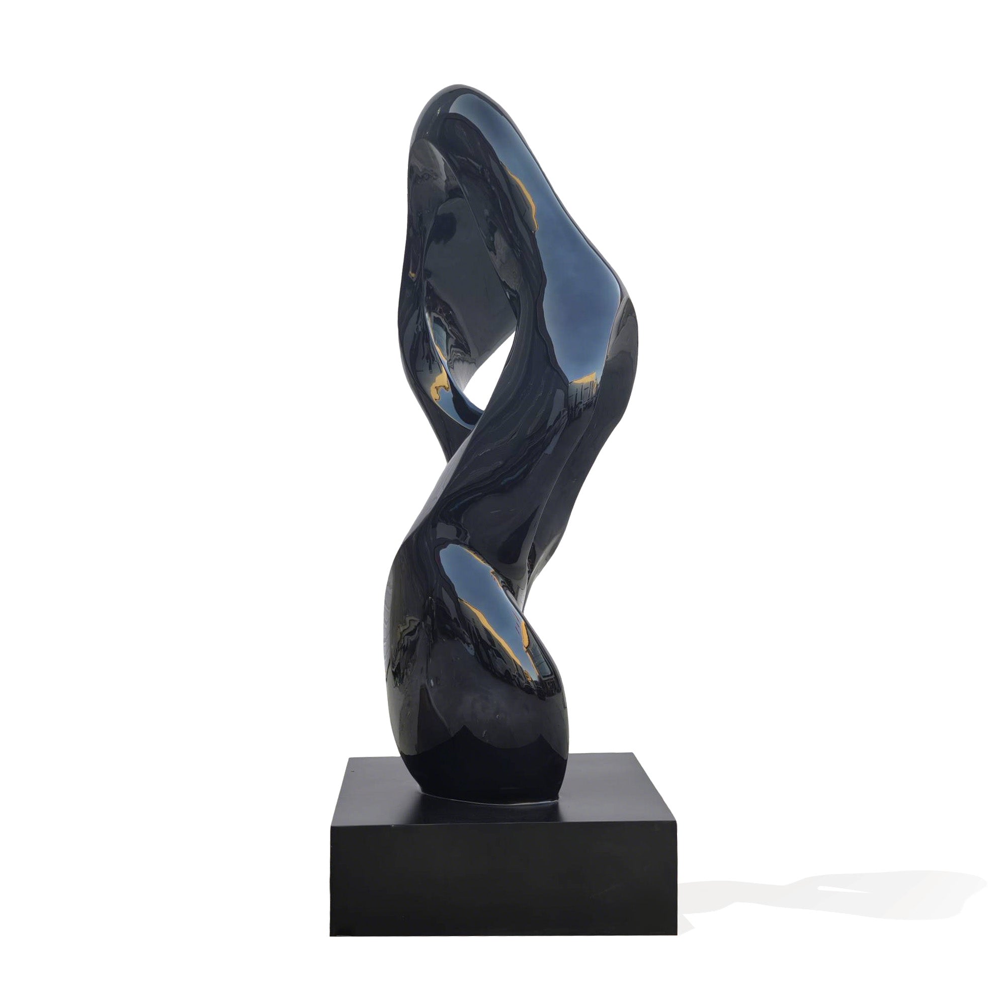 Black abstract sculpture on a white background
