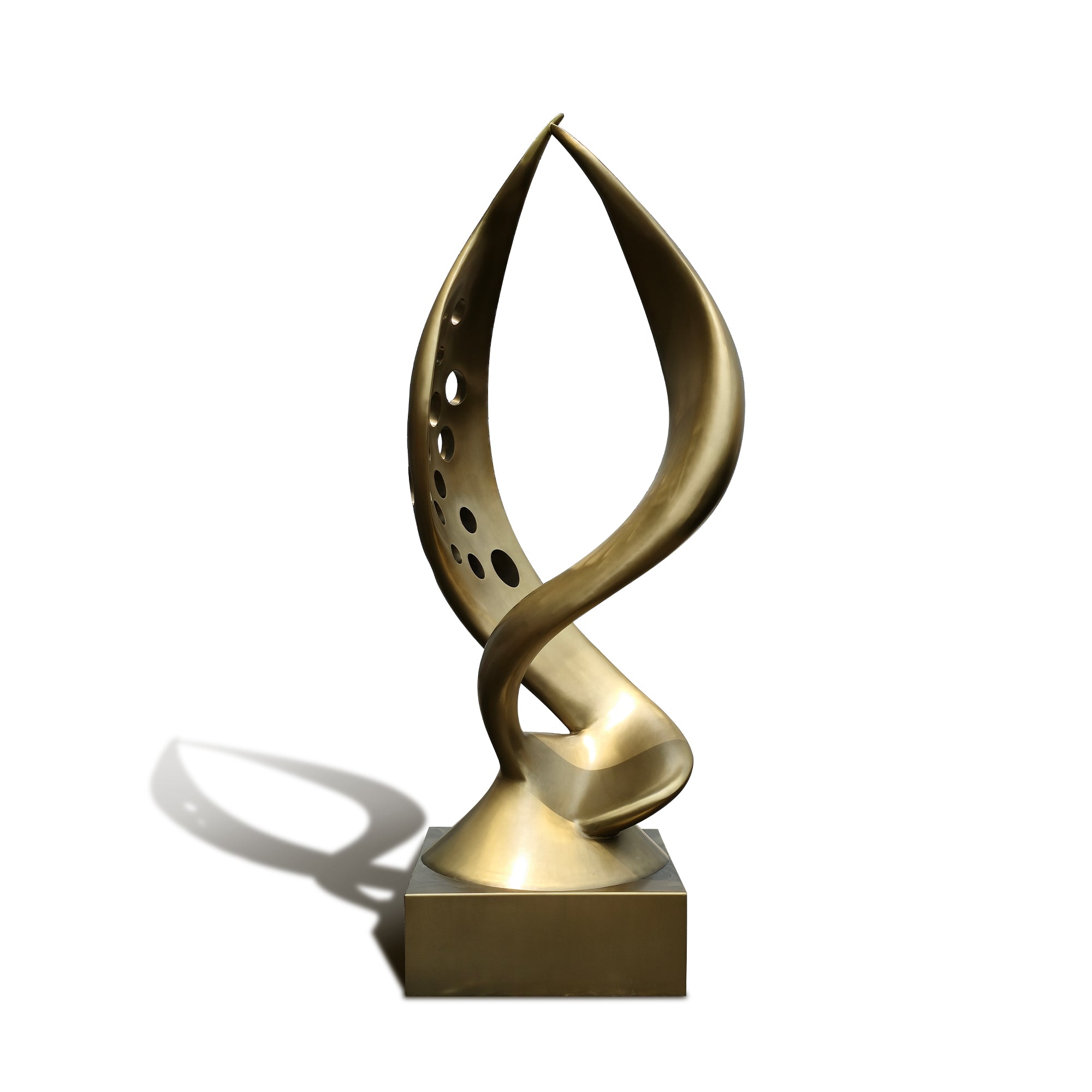 Gold abstract sculpture on a white background