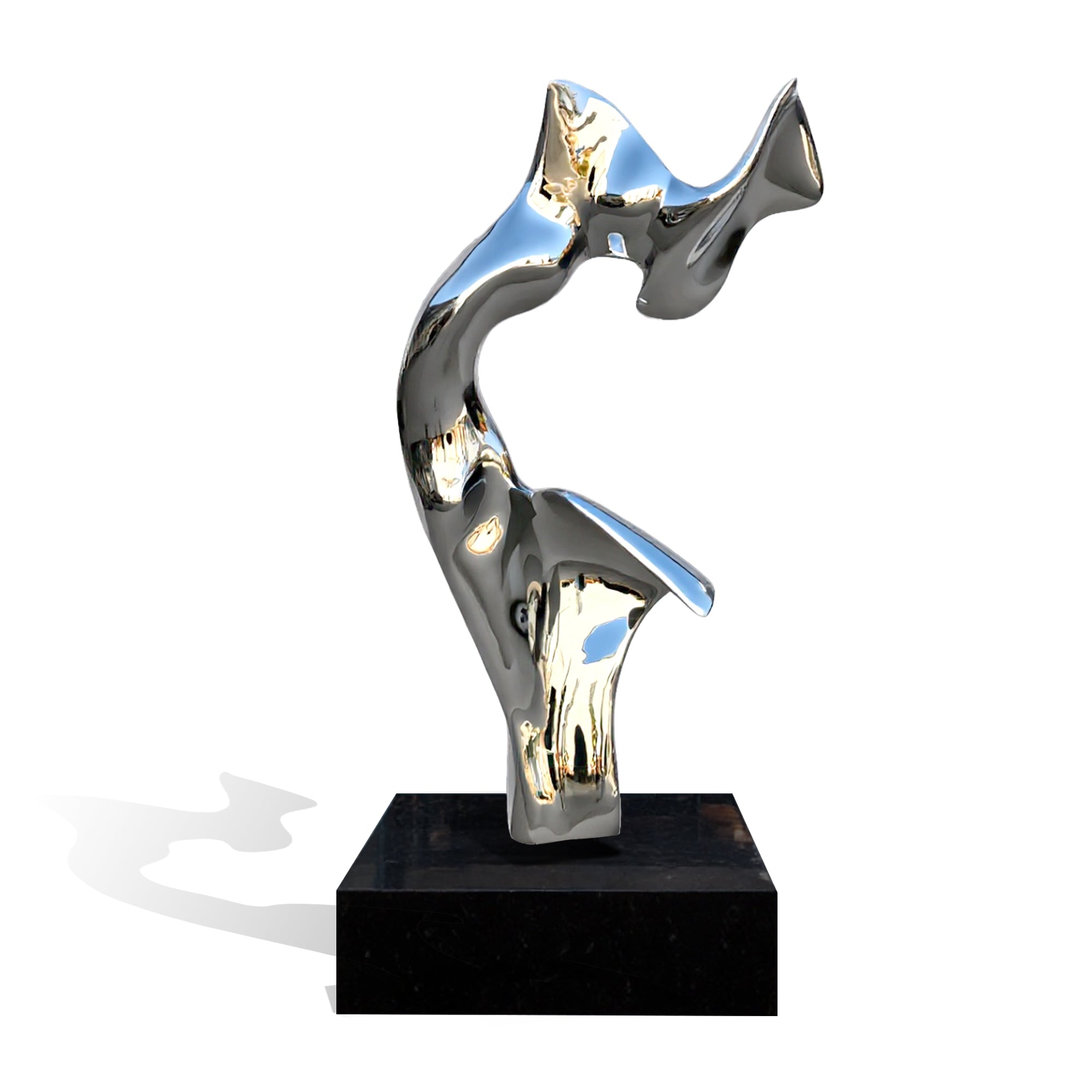 Abstract sculpture on a black base against a white background