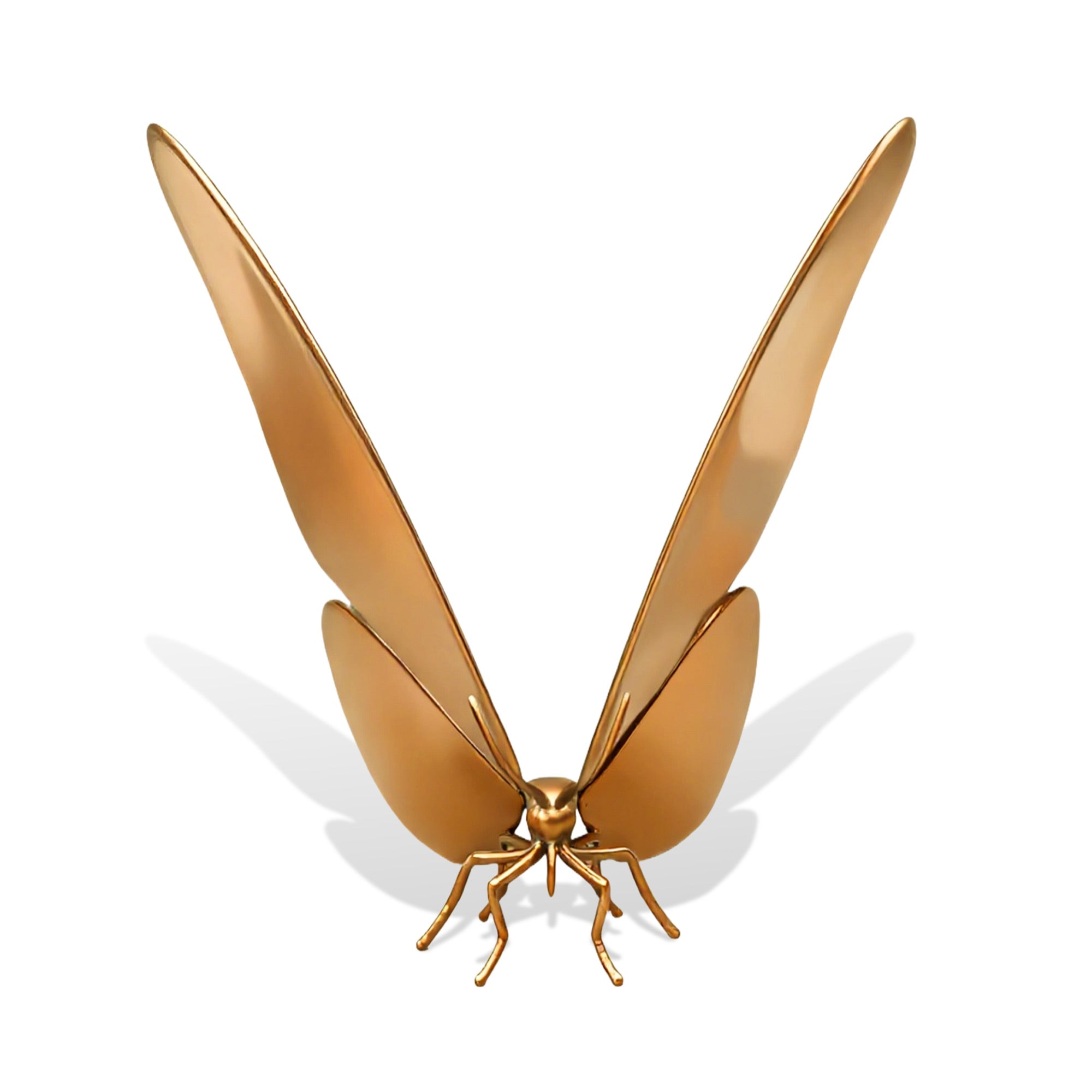Gold butterfly sculpture on a white background
