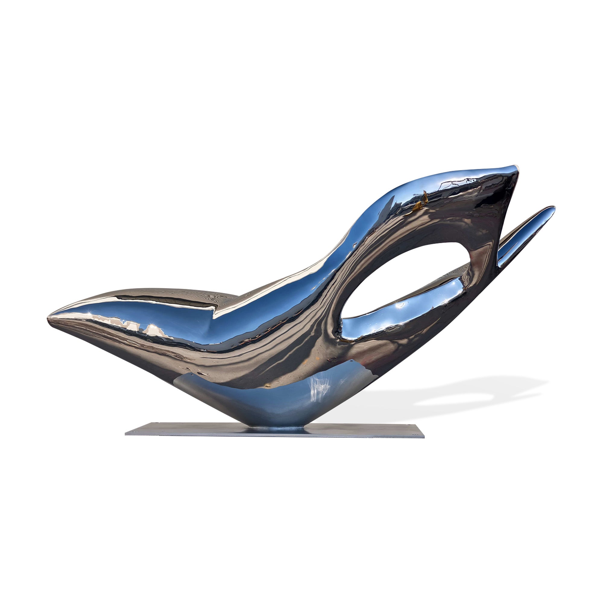 Polished stainless steel sculpture with fluid form and contemporary design, viewed from the back side to highlight its smooth curves and artistic shape