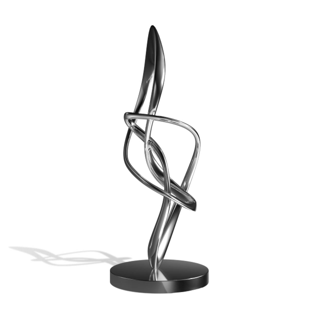 Abstract metal sculpture on a white background
