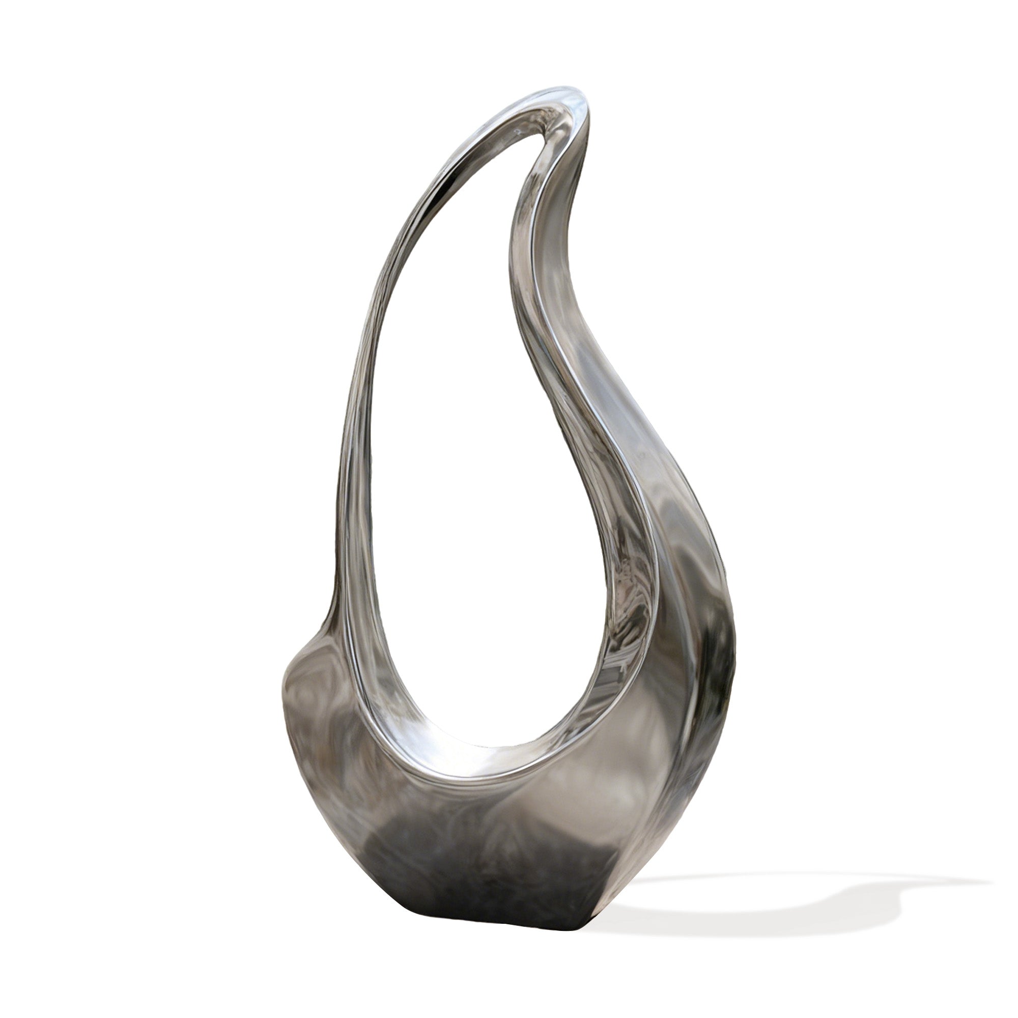 Abstract stainless steel sculpture with polished mirror surface displayed in a minimalist courtyard beside a modern building, elegant outdoor metal art for architectural landscape design.